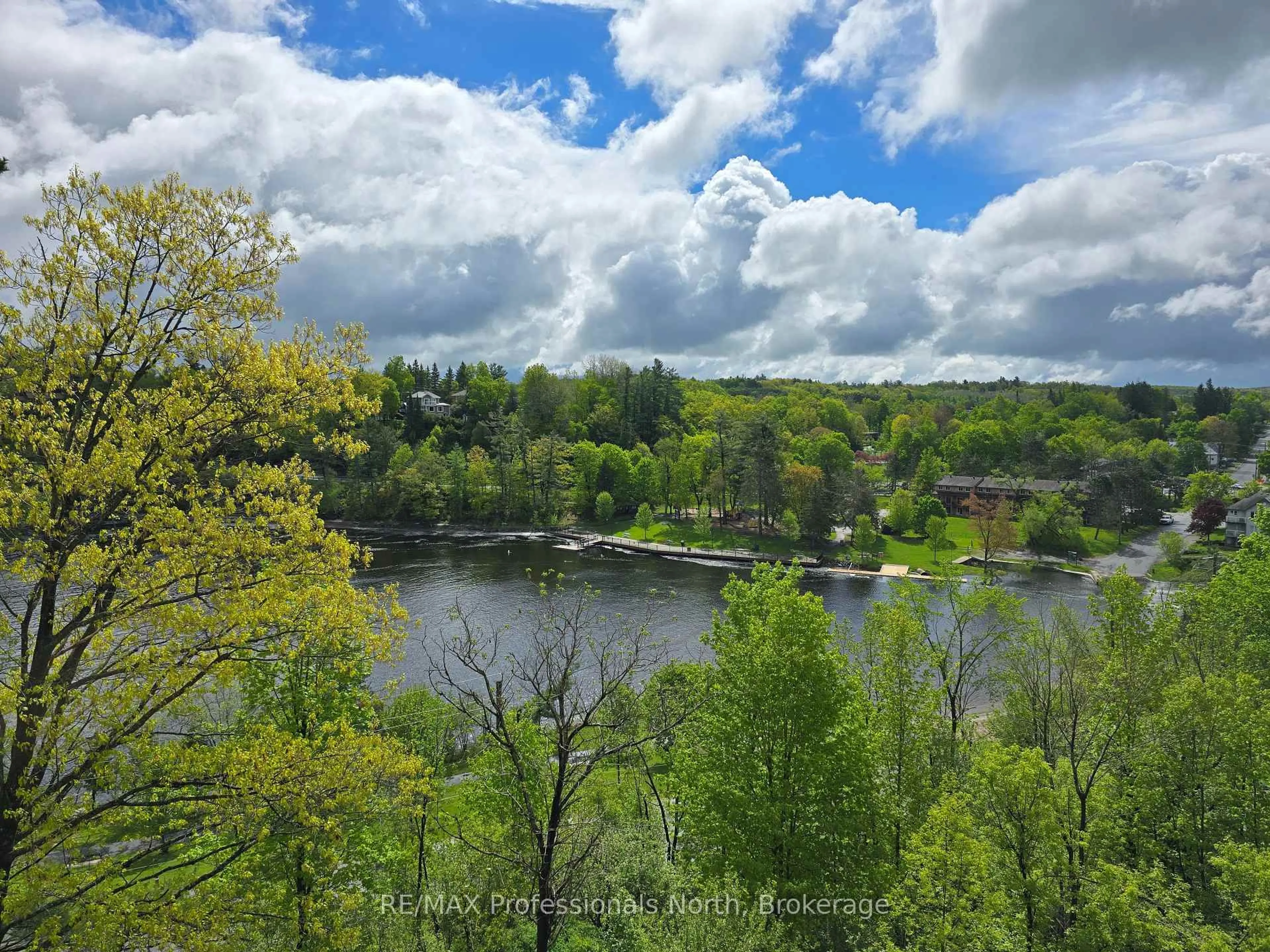 A pic from outside/outdoor area/front of a property/back of a property/a pic from drone, water/lake/river/ocean view for 10A Kimberley Ave #304, Bracebridge Ontario P1L 0A4