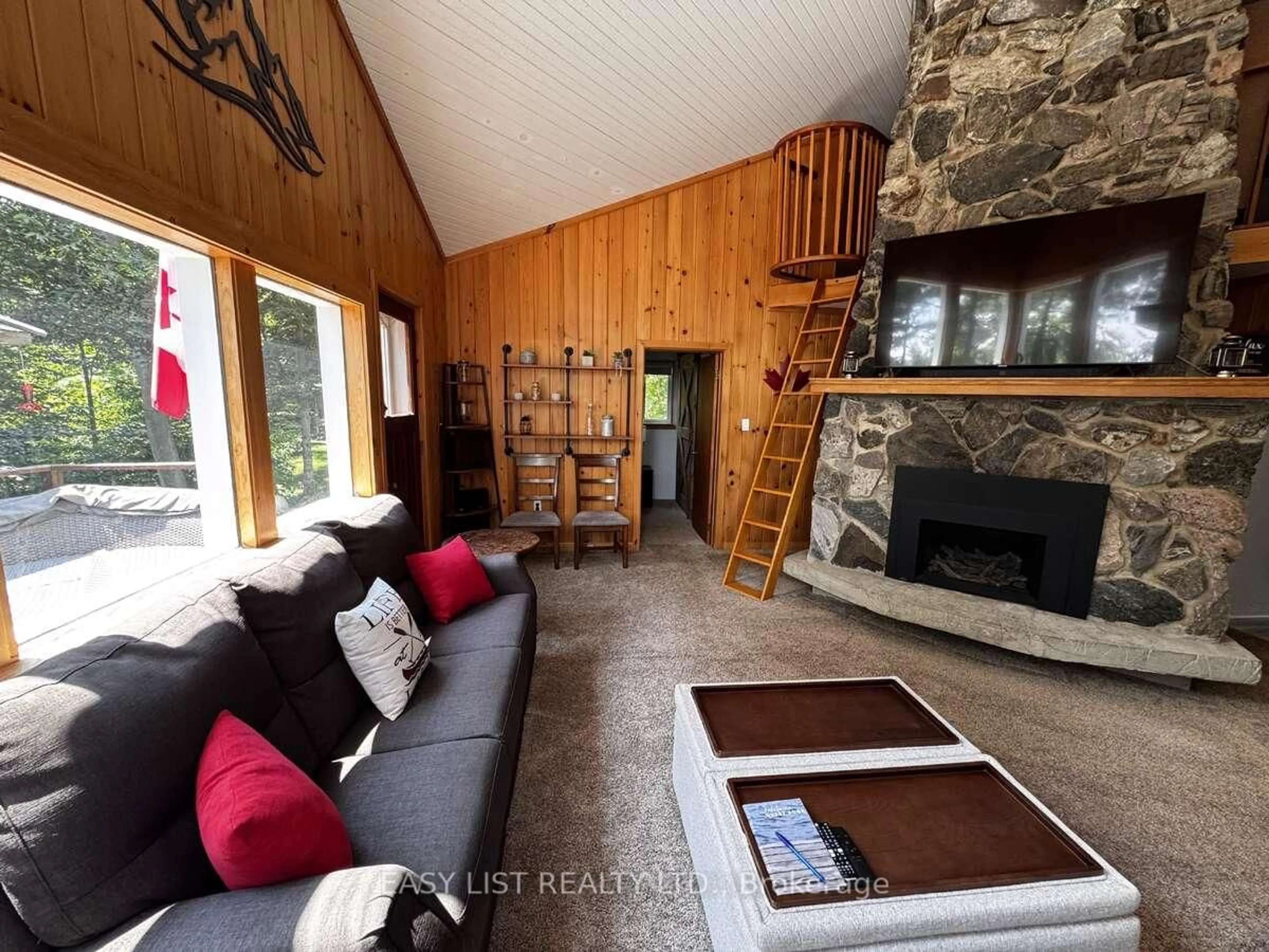 Living room with furniture, unknown for 4 Stackwall Lane, Calabogie Ontario K0J 1H0