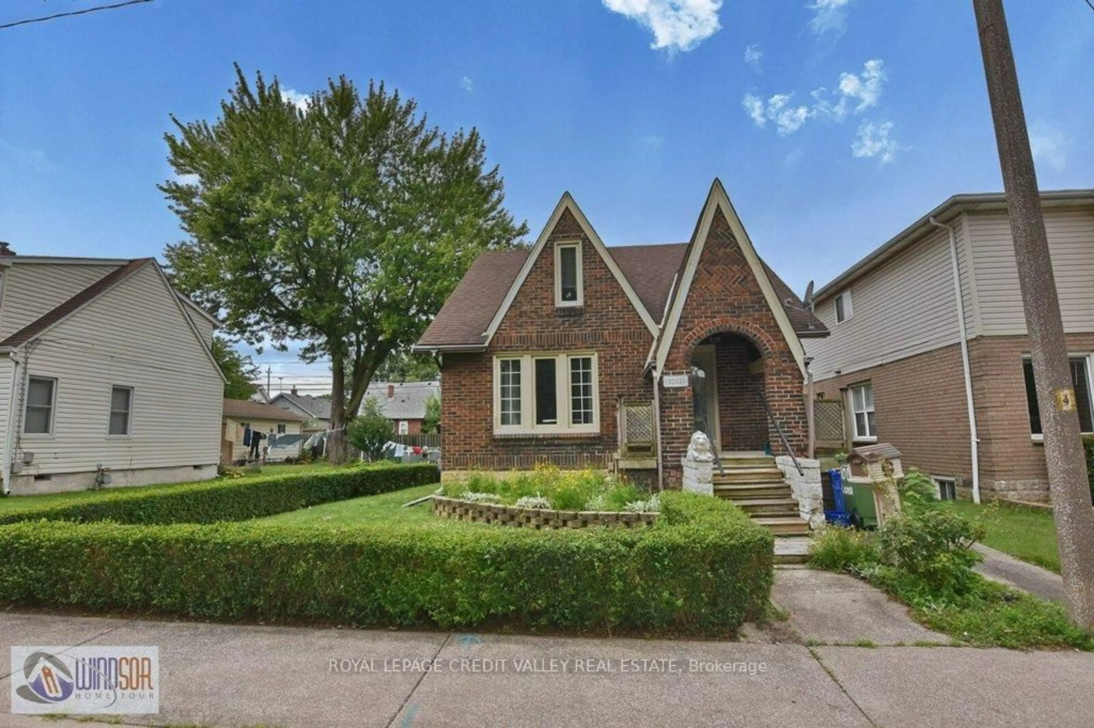 Home with brick exterior material, street for 1011 Lena Ave, Windsor Ontario N9C 3K3