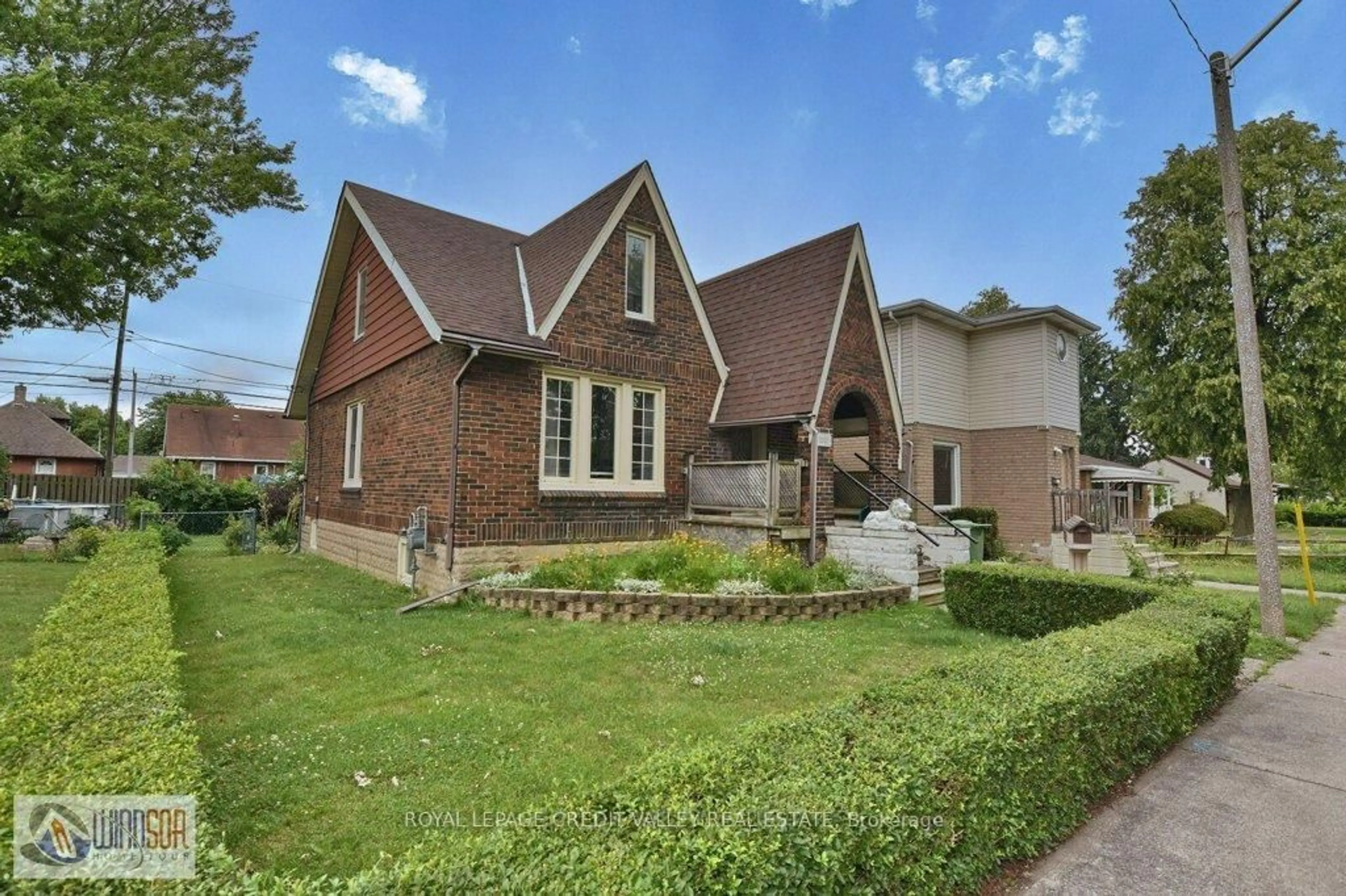 Home with brick exterior material, street for 1011 Lena Ave, Windsor Ontario N9C 3K3