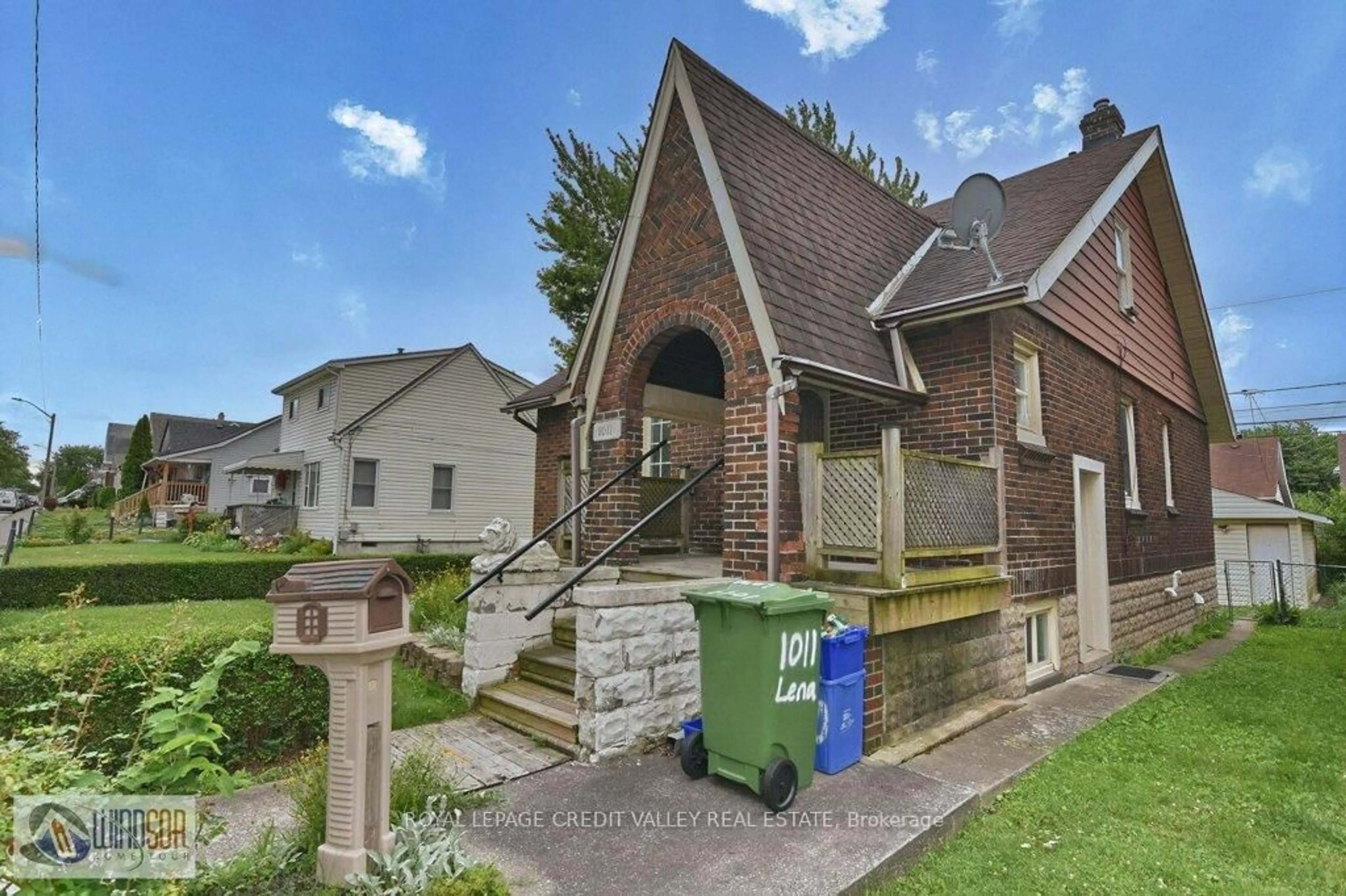 Home with brick exterior material, street for 1011 Lena Ave, Windsor Ontario N9C 3K3