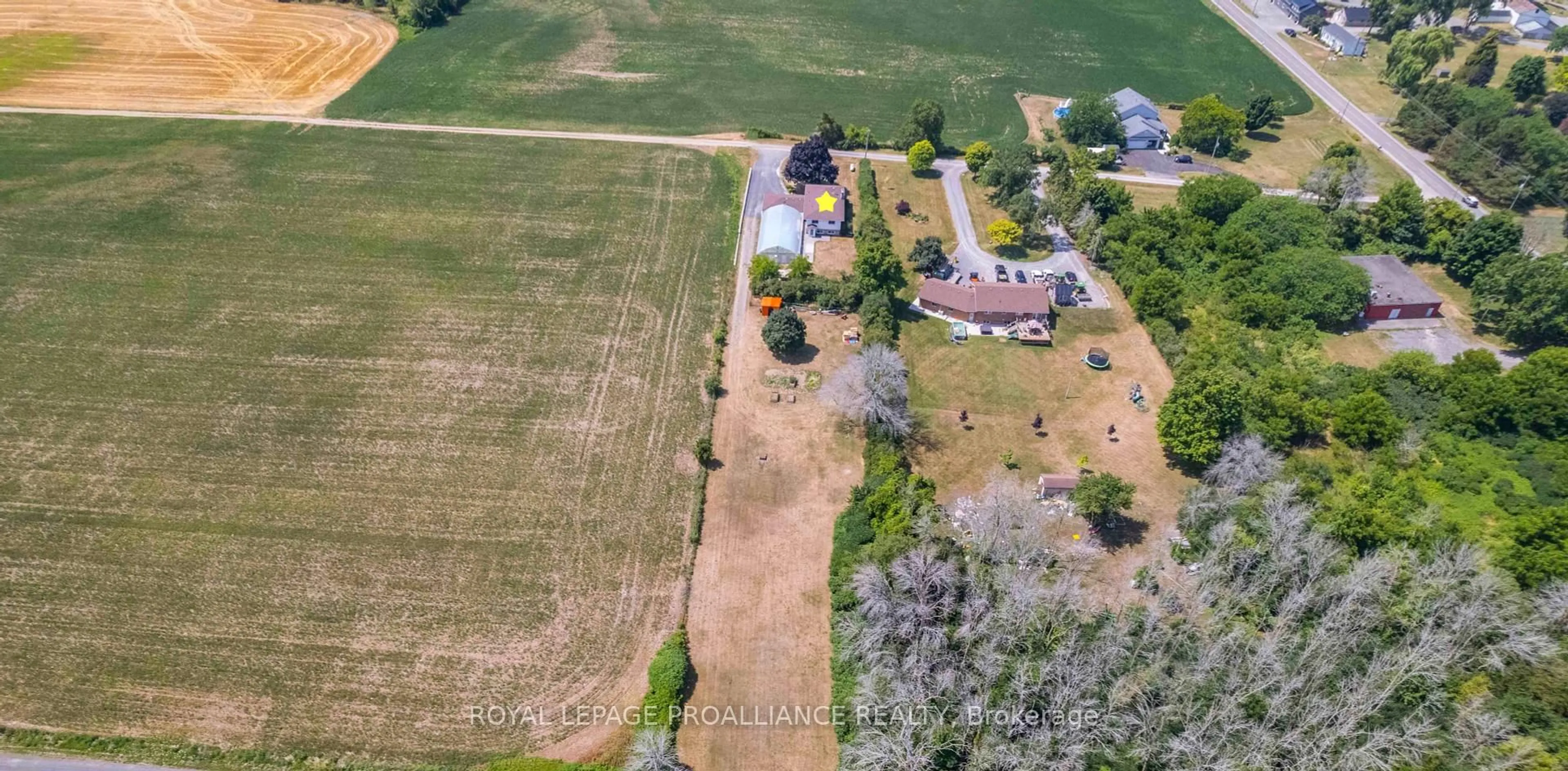 A pic from outside/outdoor area/front of a property/back of a property/a pic from drone, unknown for 37 Dempsey Rd, Prince Edward County Ontario K0K 1L0