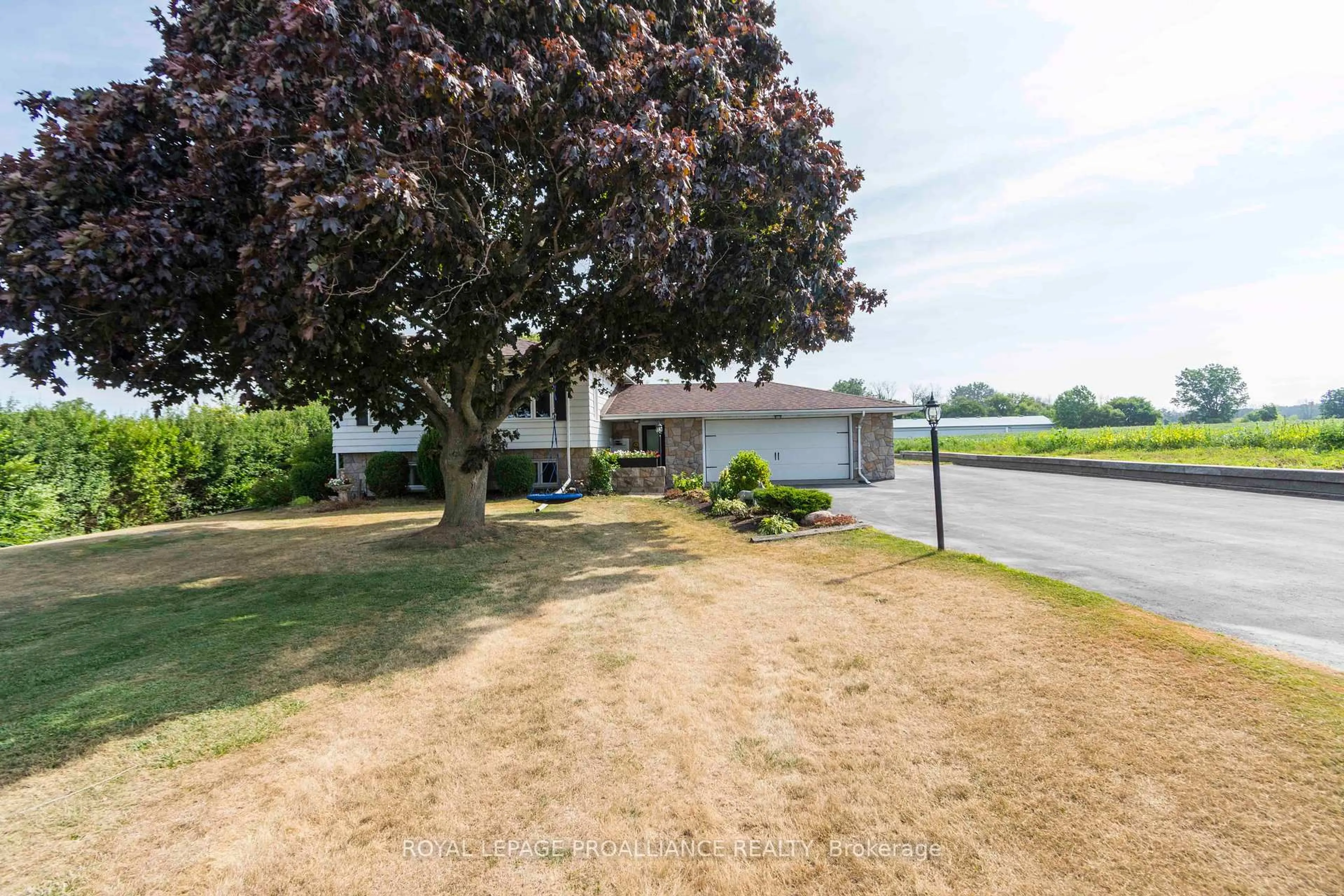 A pic from outside/outdoor area/front of a property/back of a property/a pic from drone, water/lake/river/ocean view for 37 Dempsey Rd, Prince Edward County Ontario K0K 1L0