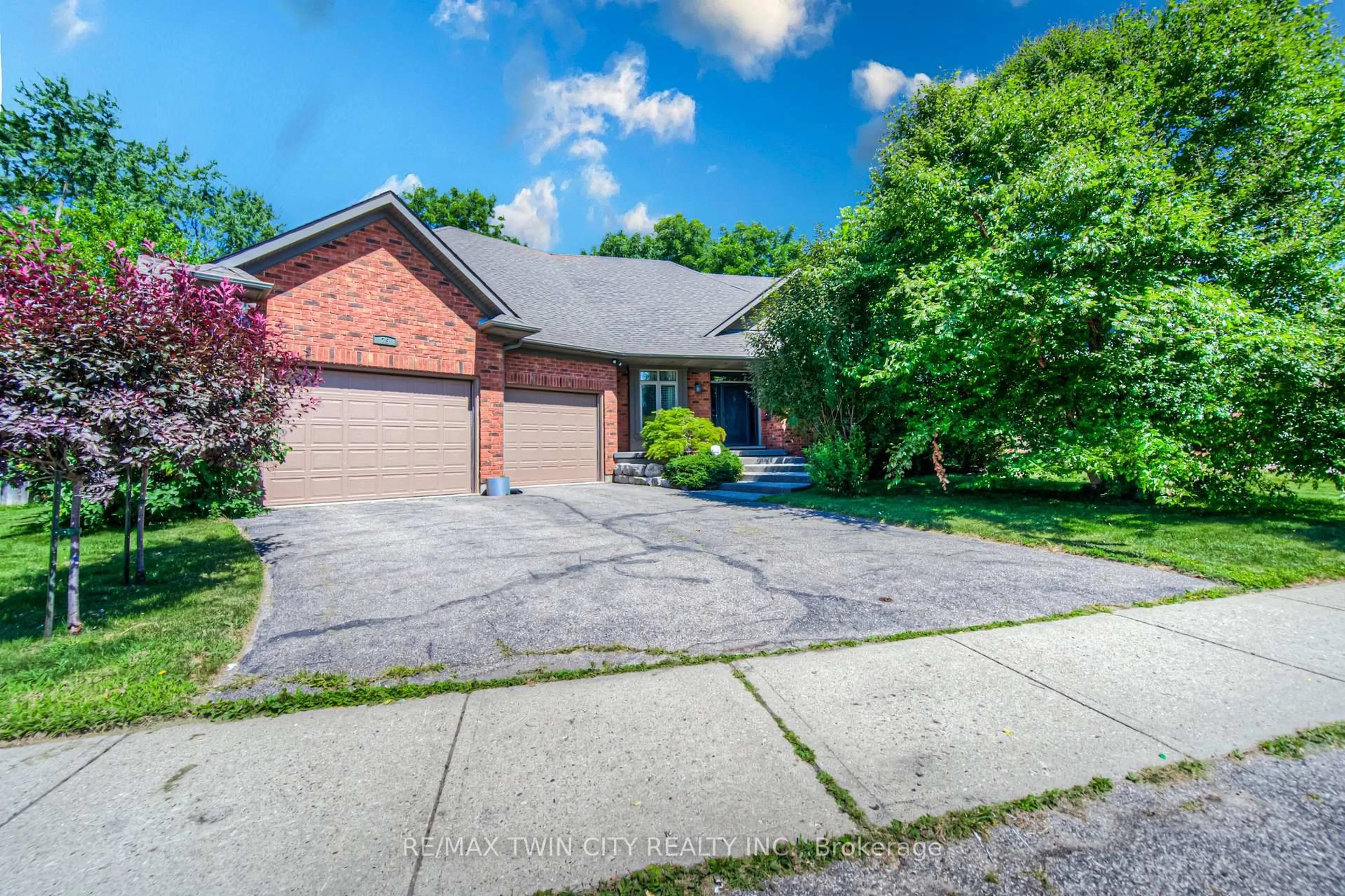 Home with brick exterior material, street for 75 Wagon St, Kitchener Ontario N2P 2V2