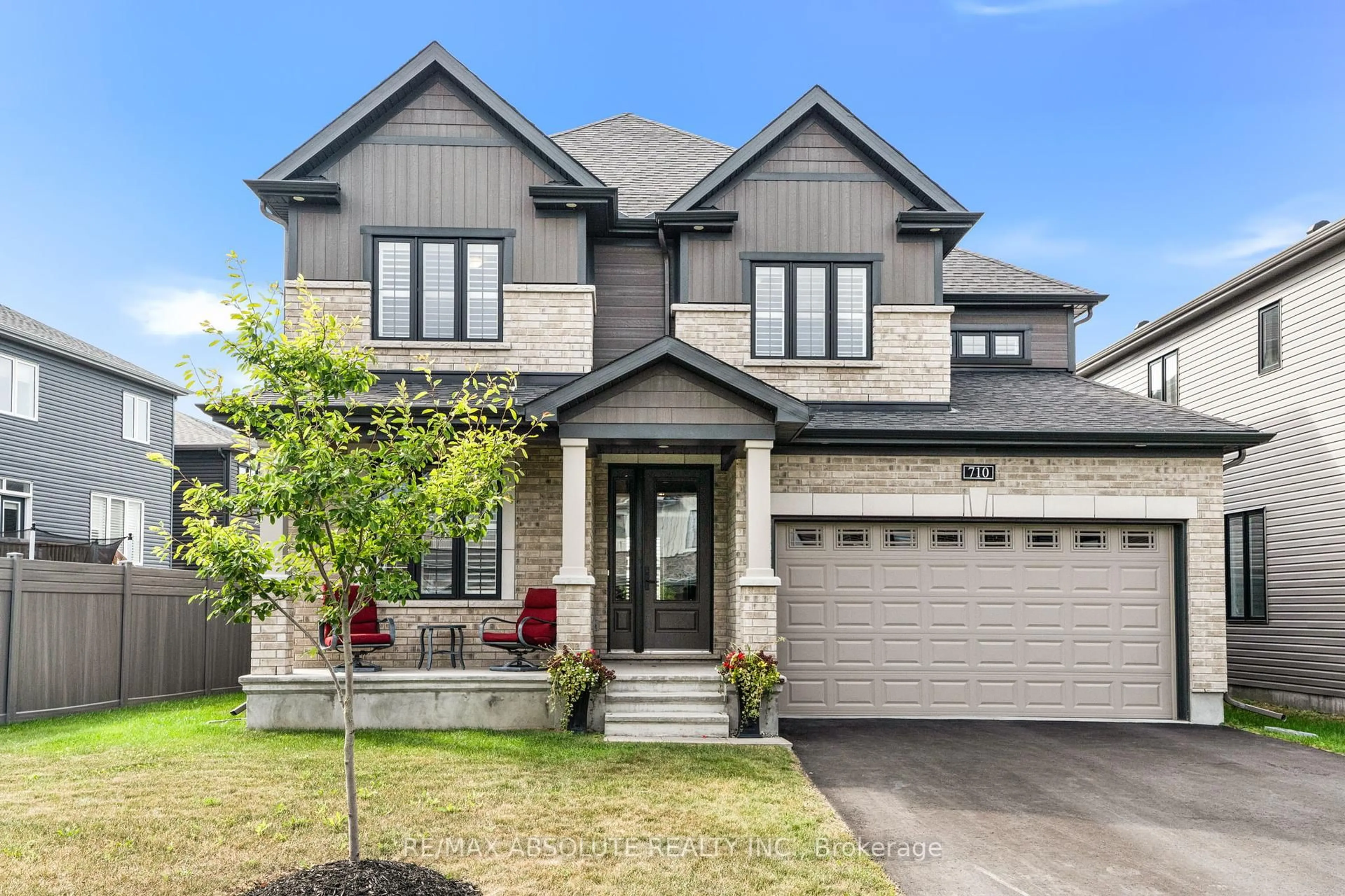 Home with brick exterior material, street for 710 Coast Circ, Manotick Ontario K4M 0N2