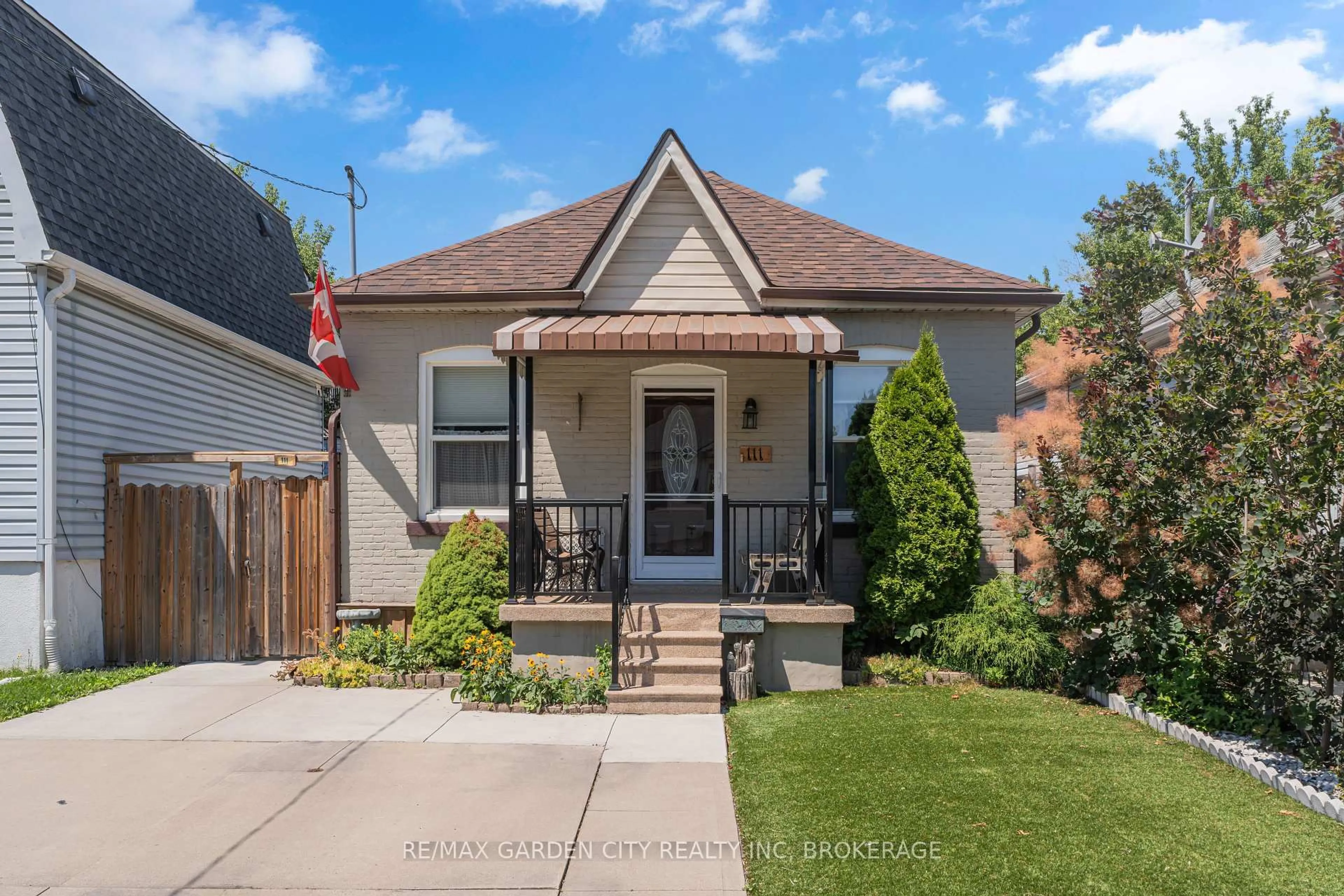 Home with brick exterior material, street for 111 London St, Hamilton Ontario L8H 4B4