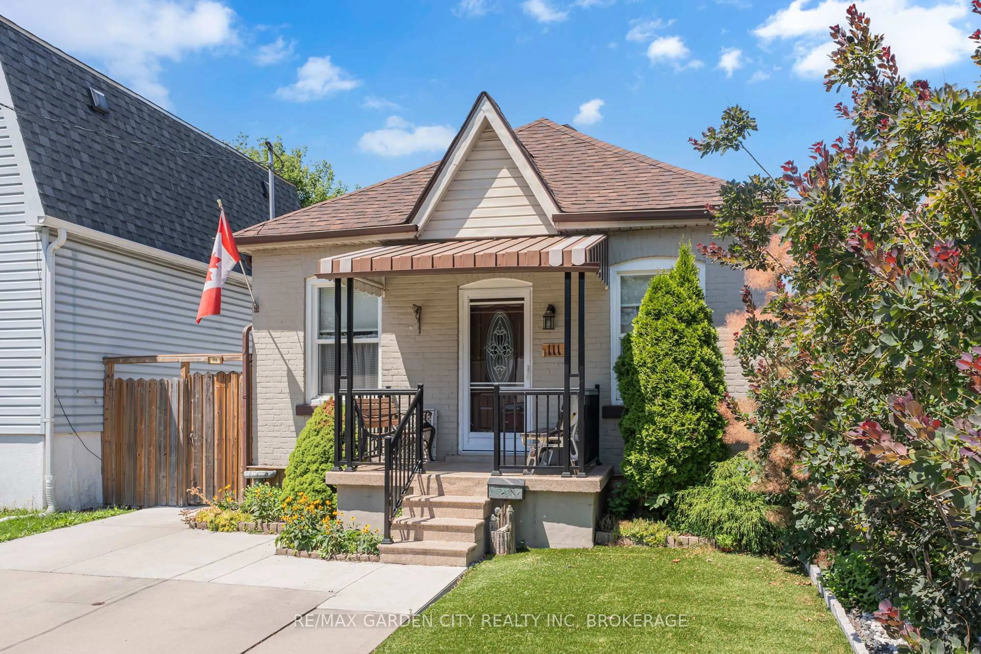 Home with brick exterior material, street for 111 London St, Hamilton Ontario L8H 4B4