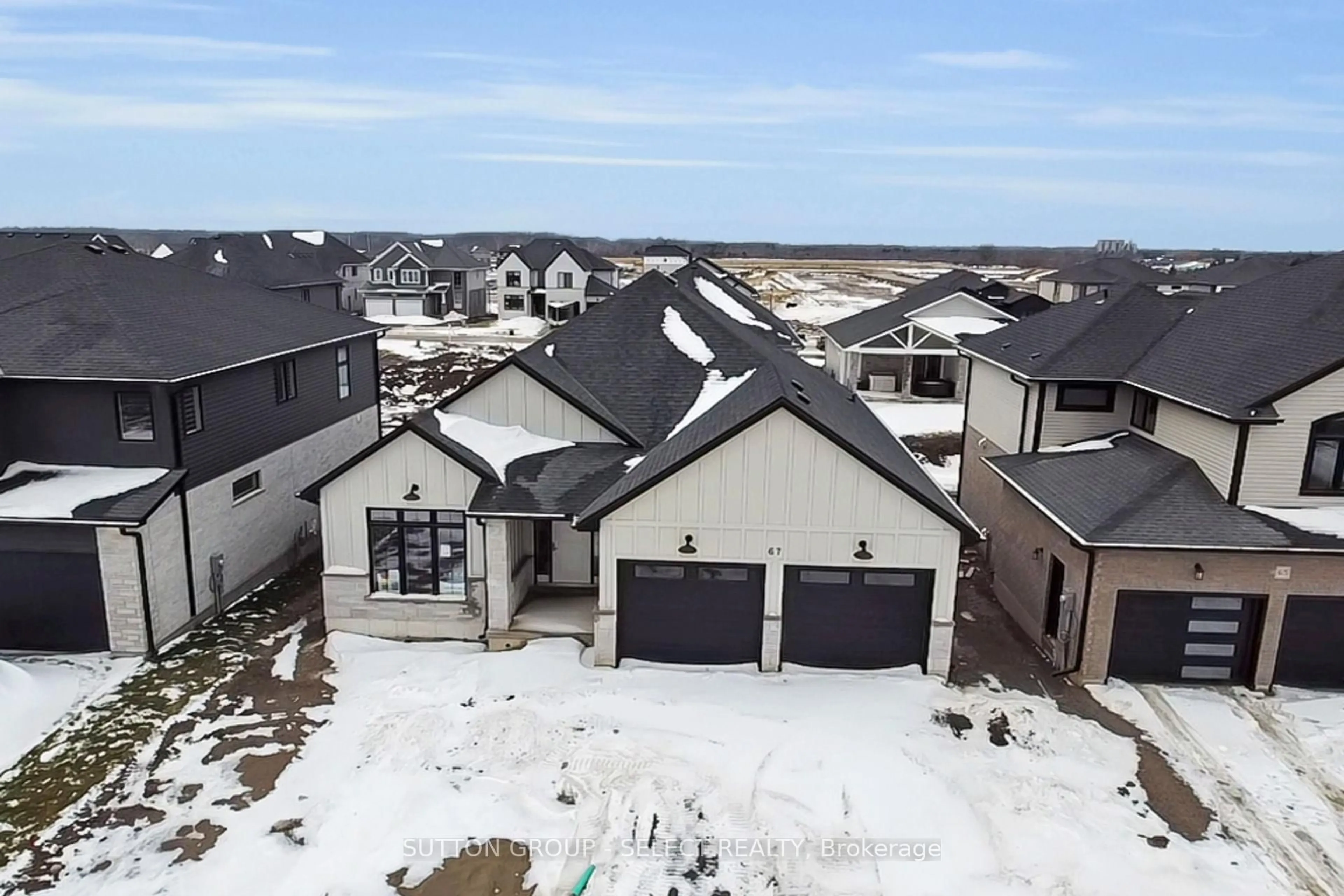 A pic from outside/outdoor area/front of a property/back of a property/a pic from drone, street for 67 Royal Acre, Southwold Ontario N5P 3T2