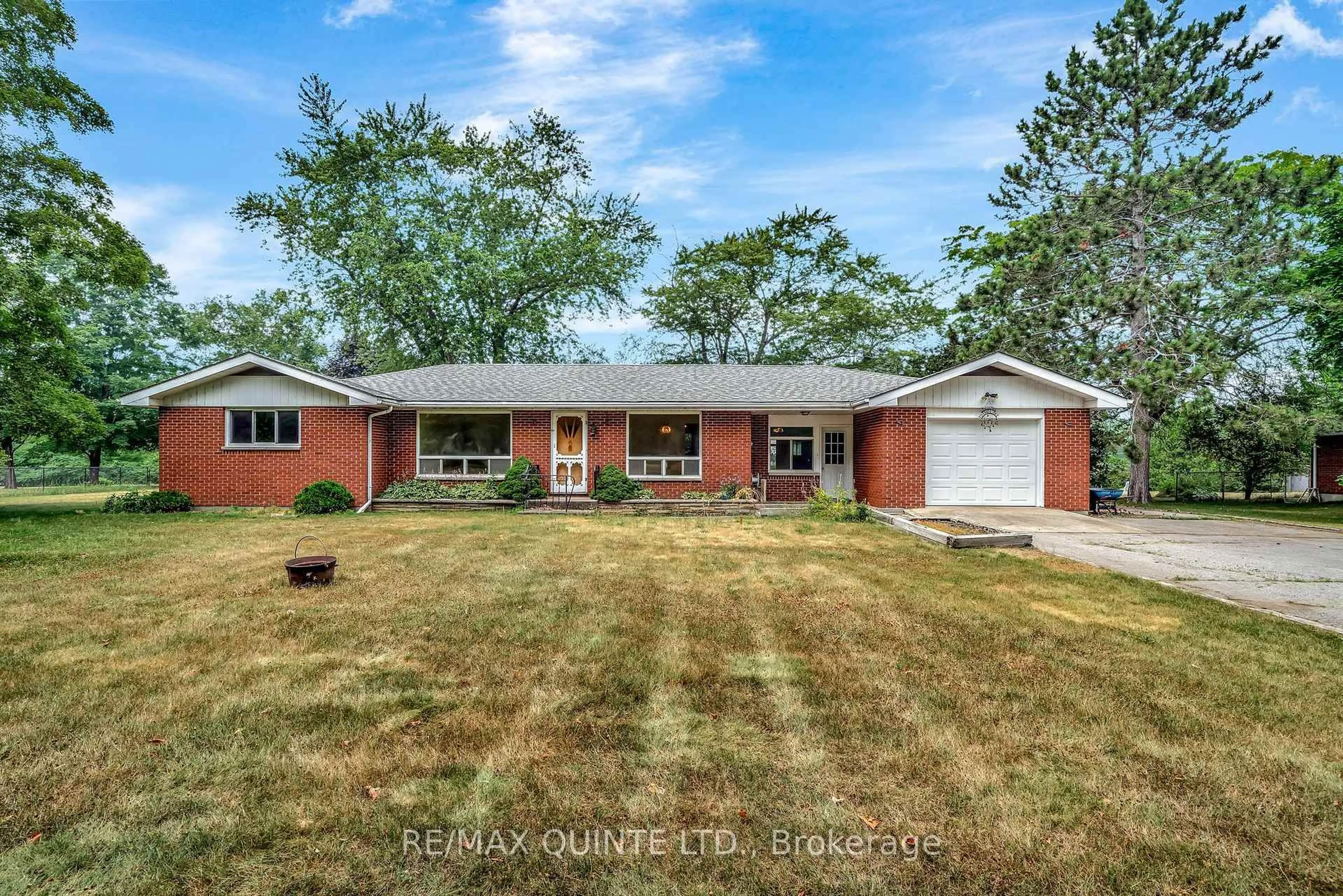 Home with brick exterior material, street for 1462 County Road 12, Prince Edward County Ontario K0K 2T0