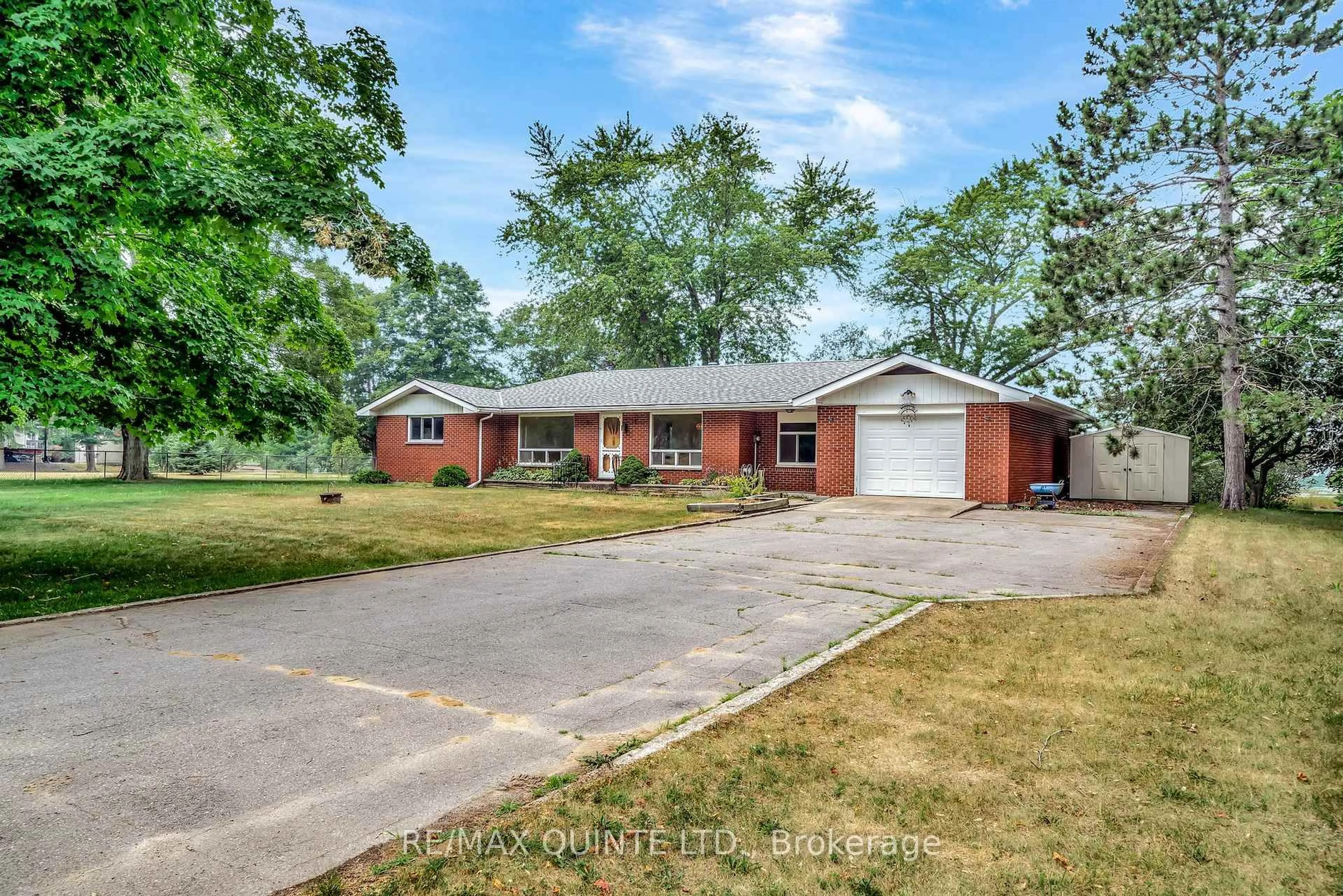 Home with brick exterior material, street for 1462 County Road 12, Prince Edward County Ontario K0K 2T0