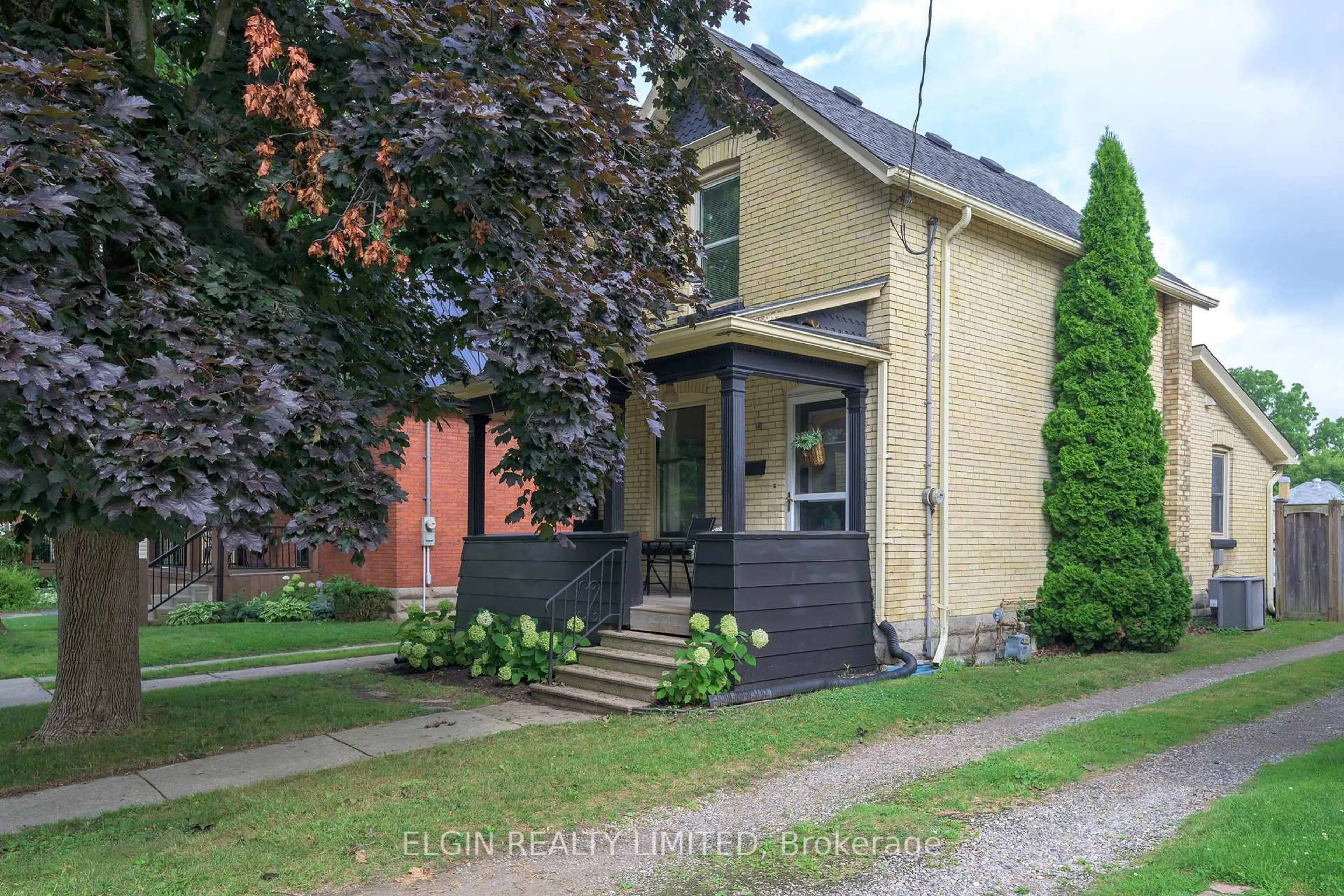Home with brick exterior material, street for 24 Maple St, St. Thomas Ontario N5R 1Y9
