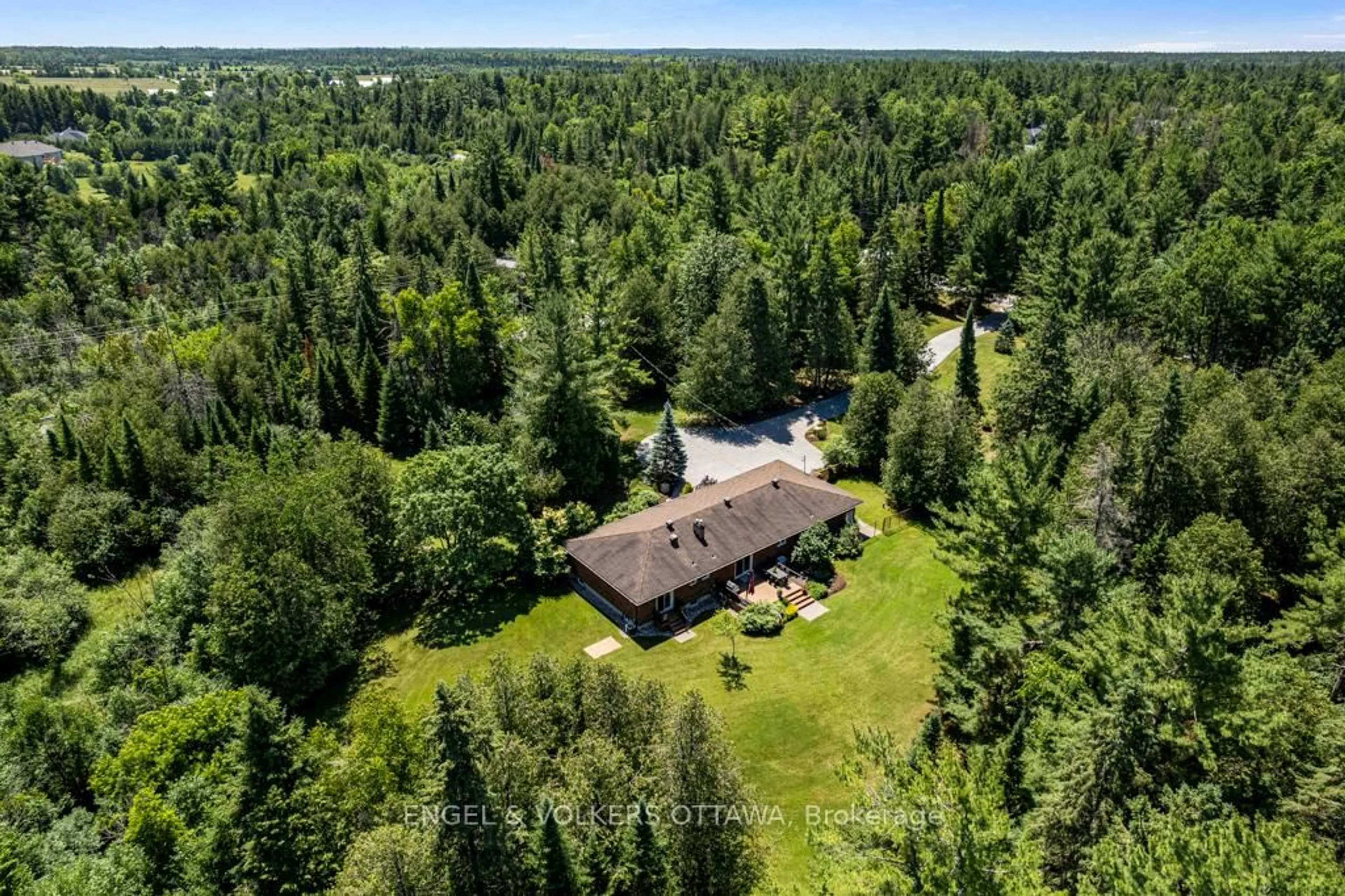 A pic from outside/outdoor area/front of a property/back of a property/a pic from drone, forest/trees view for 656 Spruce Ridge Rd, Carp Ontario K0A 1L0