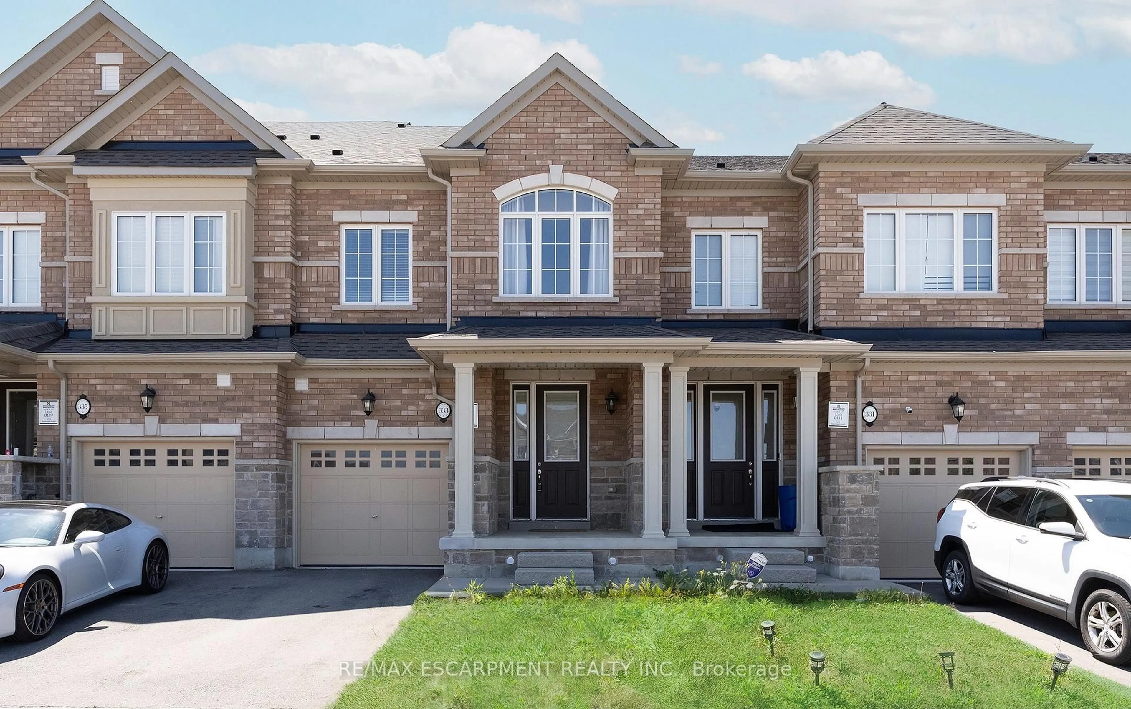 Home with brick exterior material, street for 333 Raymond Rd, Hamilton Ontario L9K 0G8