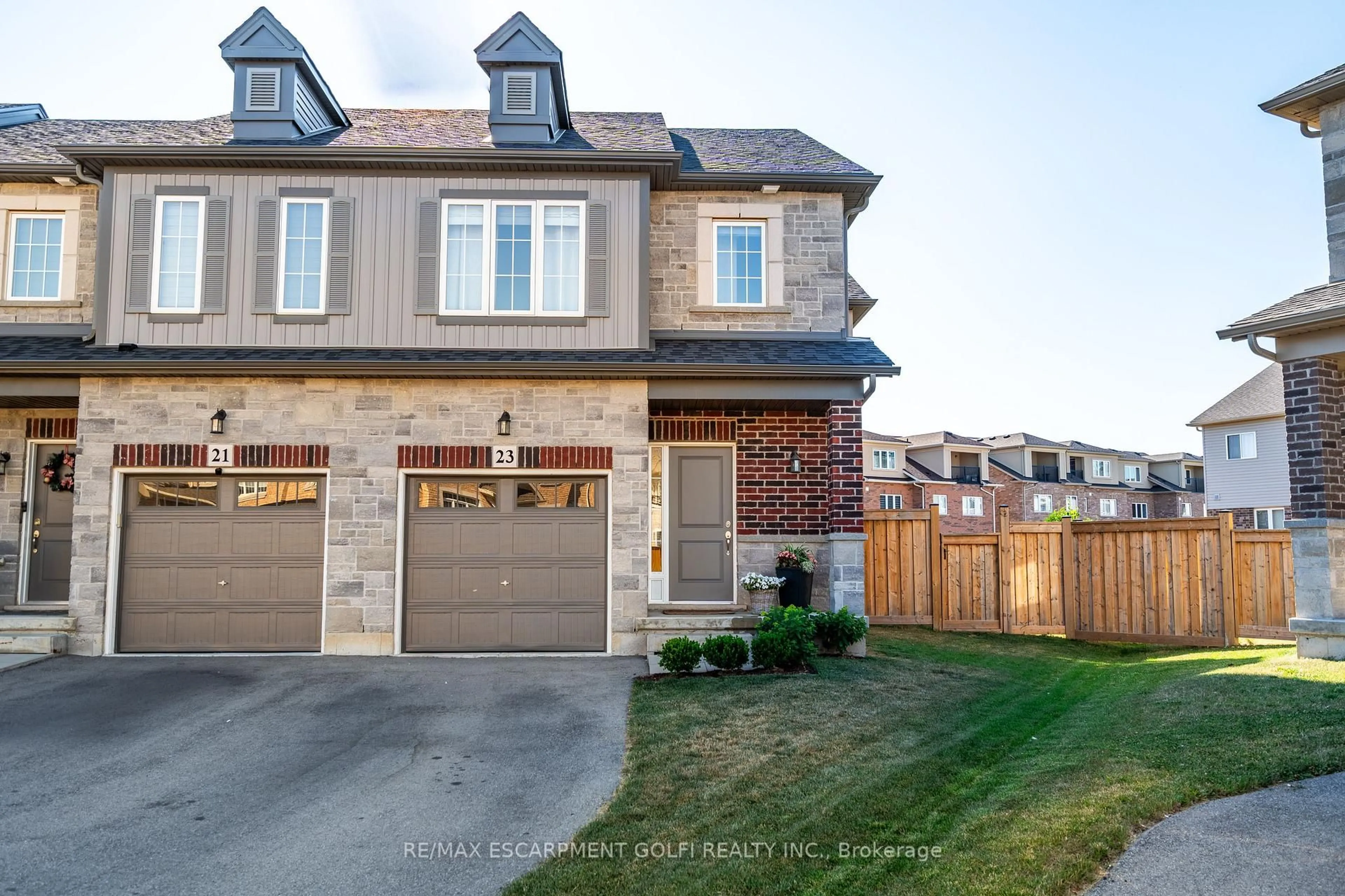 Home with brick exterior material, street for 23 Beasley Grve, Hamilton Ontario L9K 0J7