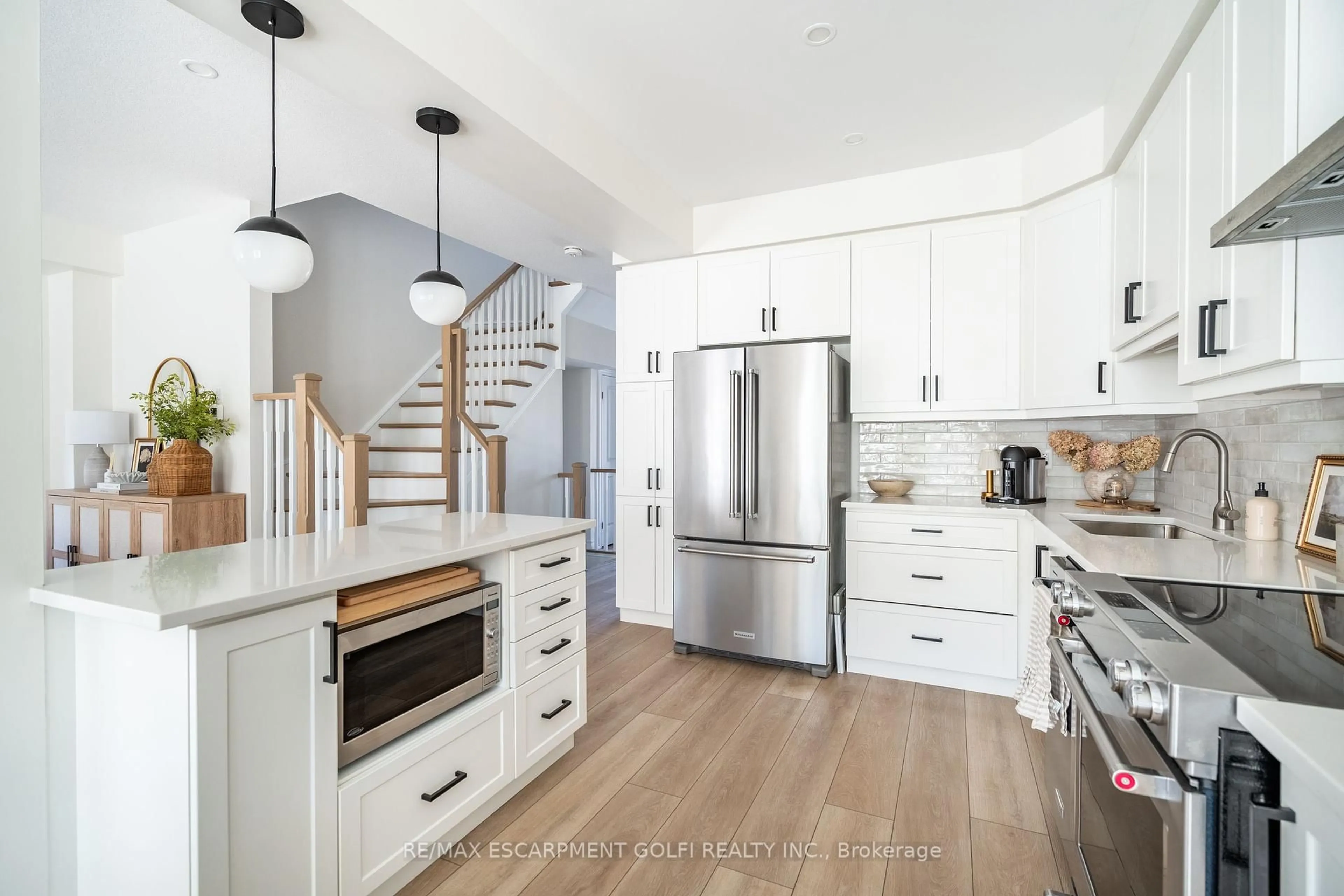 Open concept kitchen, unknown for 23 Beasley Grve, Hamilton Ontario L9K 0J7