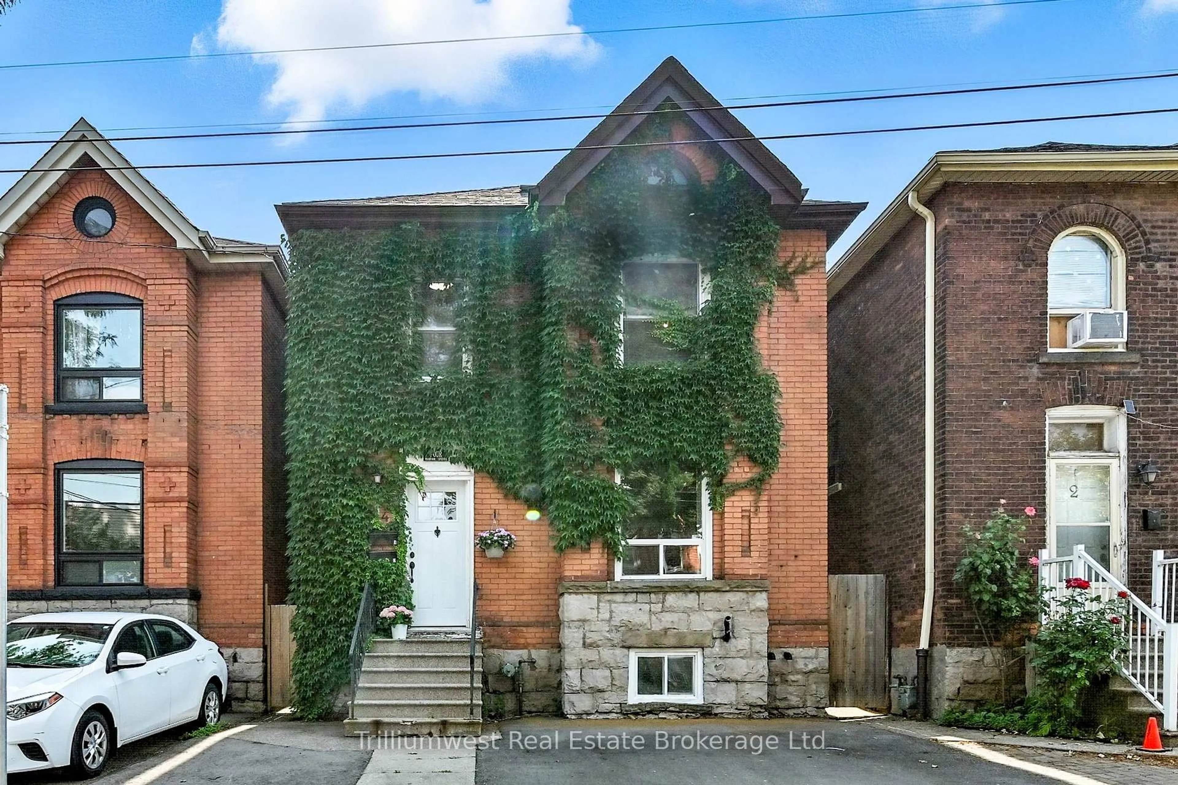 Home with brick exterior material, street for 4 Madison Ave, Hamilton Ontario L8L 5Y3