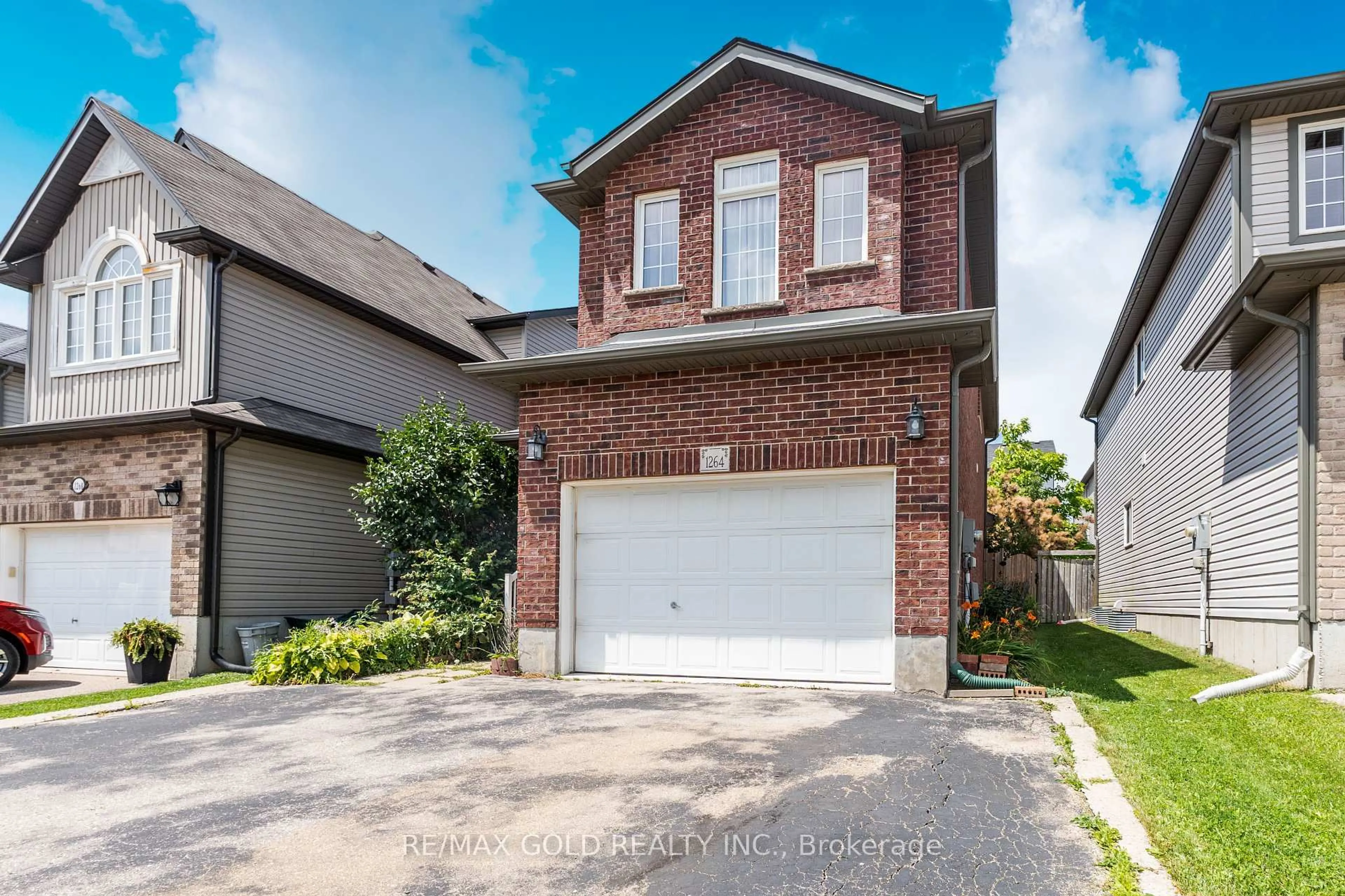 Home with brick exterior material, street for 1264 Countrystone Dr, Kitchener Ontario N2N 3S4