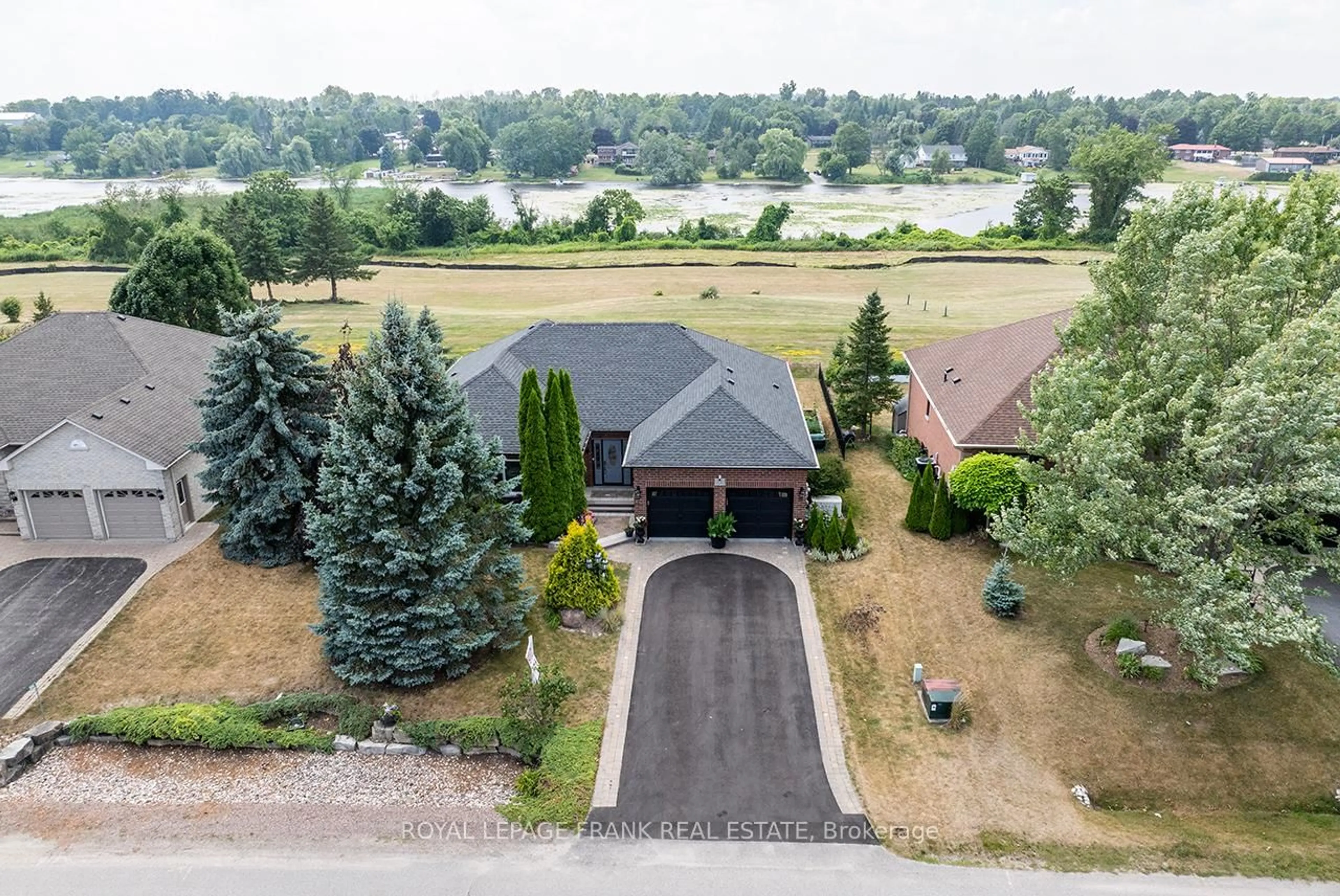 A pic from outside/outdoor area/front of a property/back of a property/a pic from drone, water/lake/river/ocean view for 202 Southcrest Dr, Kawartha Lakes Ontario L0C 1G0