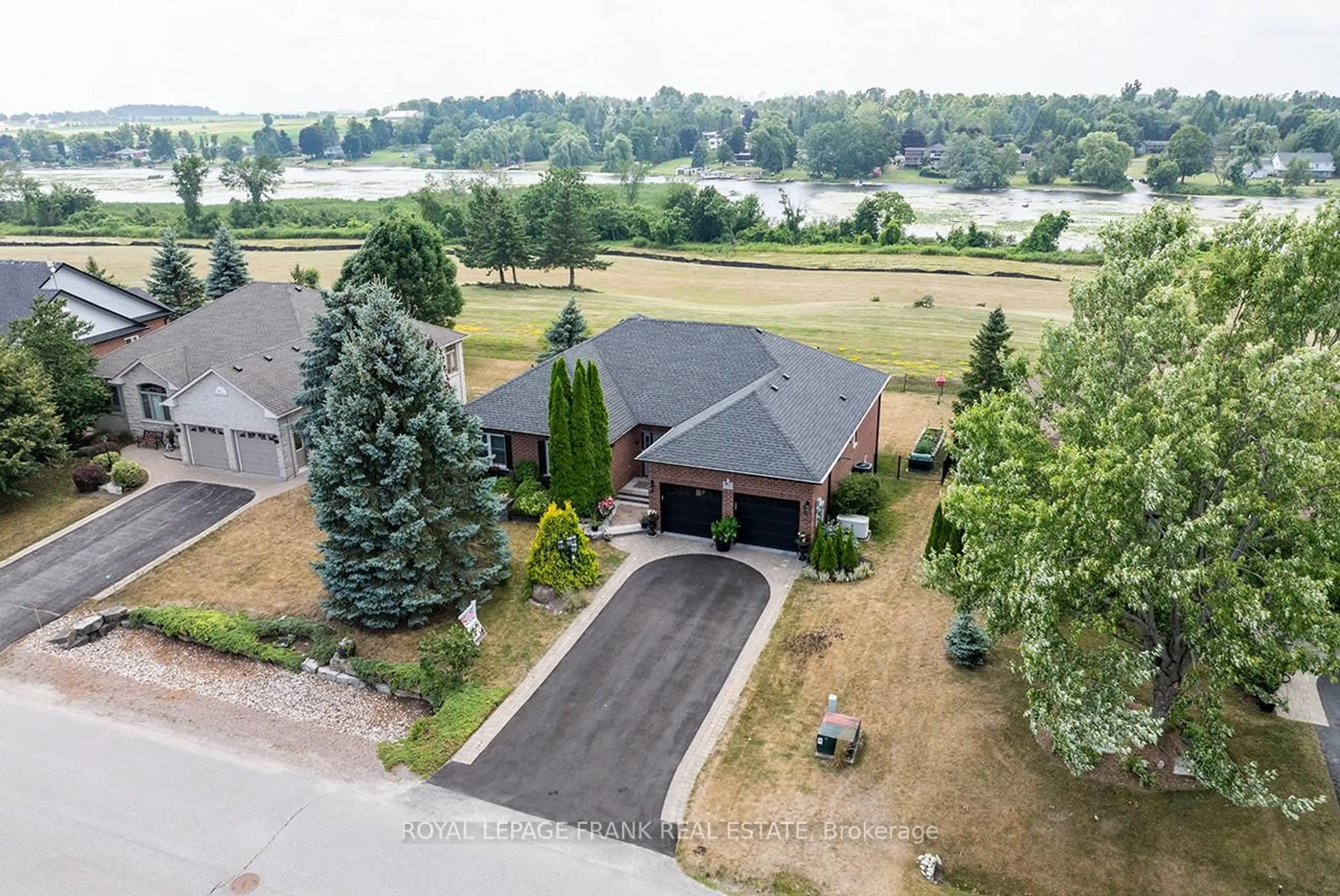 A pic from outside/outdoor area/front of a property/back of a property/a pic from drone, water/lake/river/ocean view for 202 Southcrest Dr, Kawartha Lakes Ontario L0C 1G0