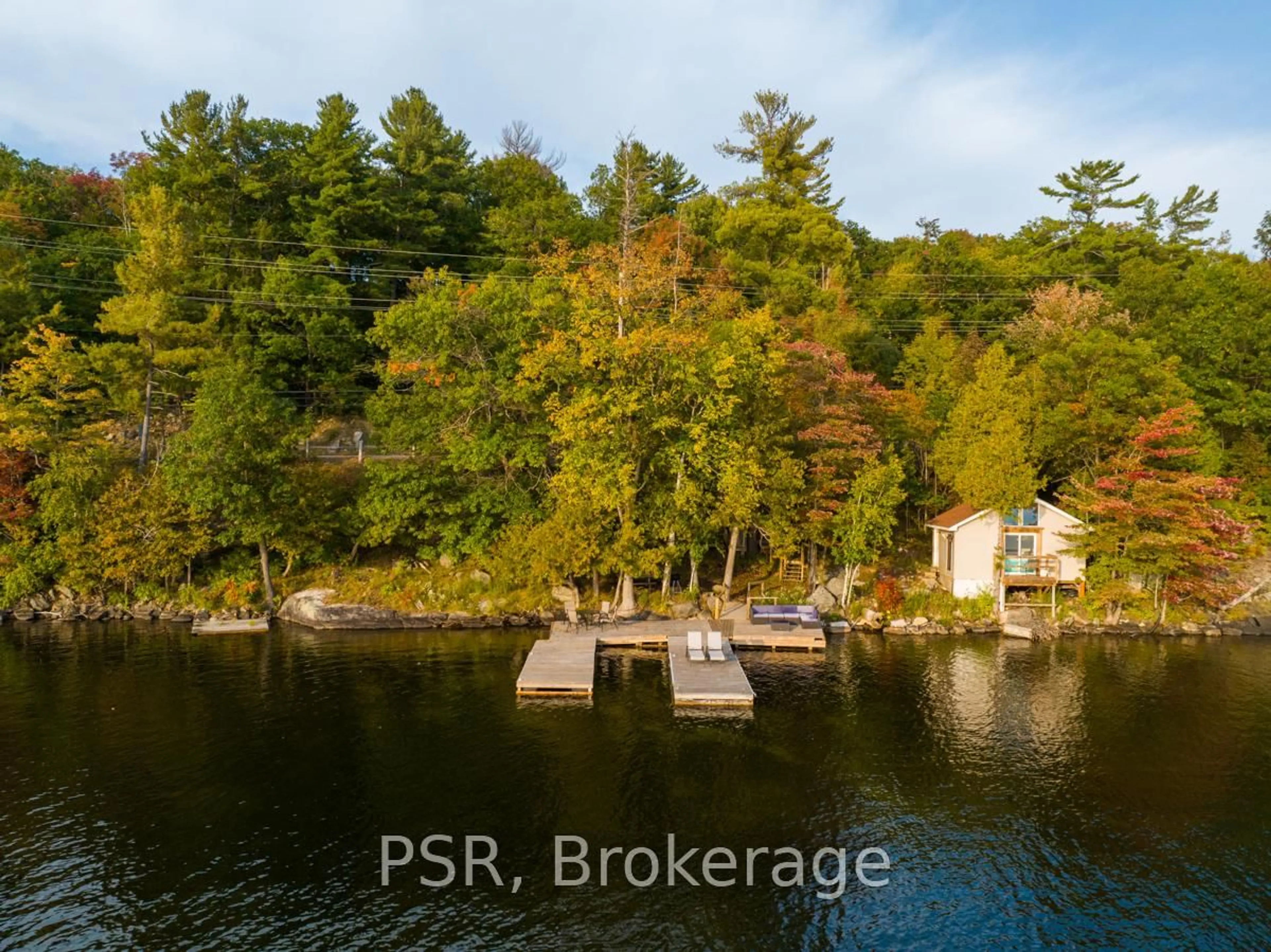 A pic from outside/outdoor area/front of a property/back of a property/a pic from drone, water/lake/river/ocean view for 1-1356 & 1357 Peninsula Rd, Muskoka Lakes Ontario P0B 1J0