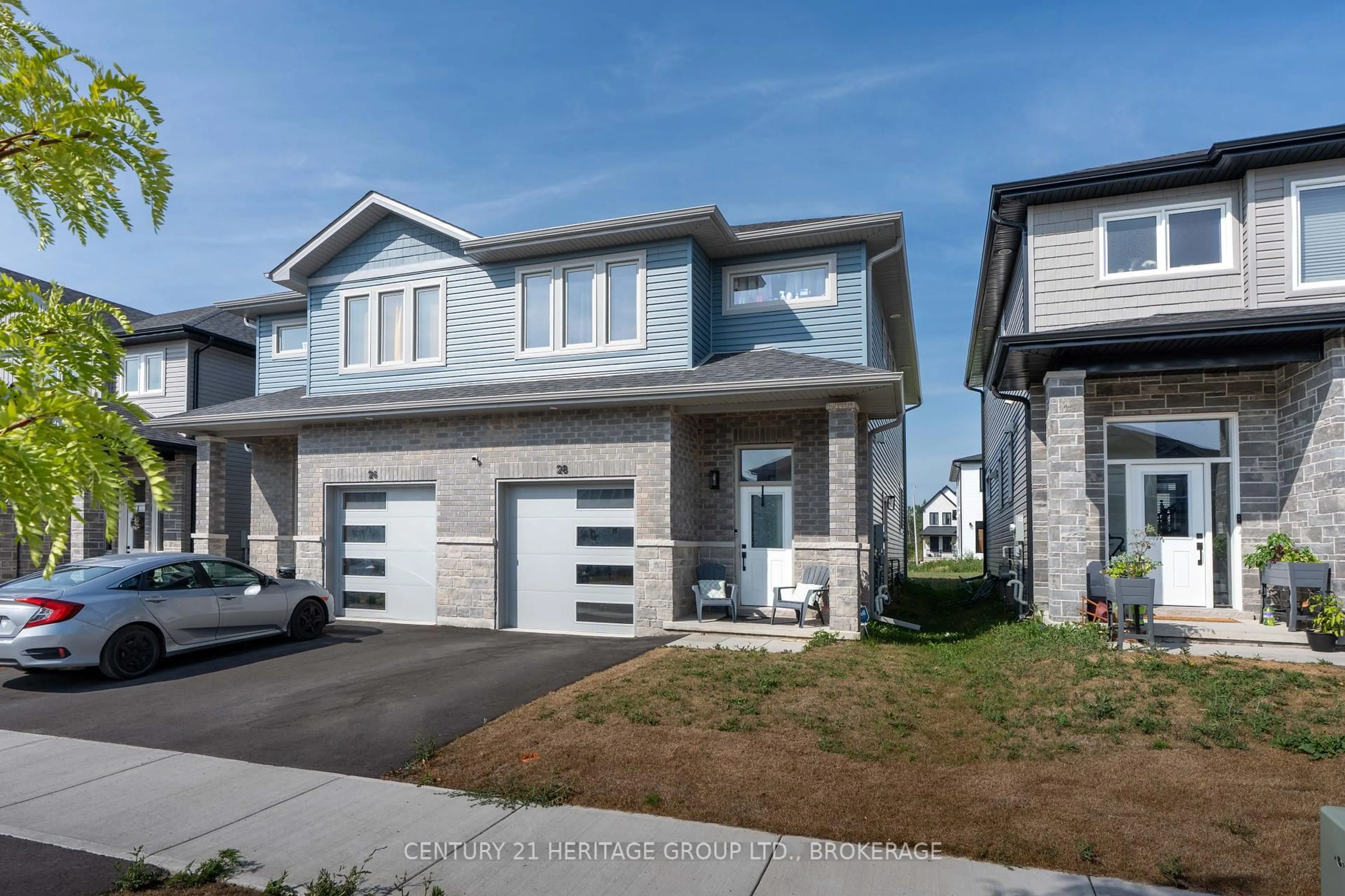 Home with vinyl exterior material, street for 28 Dusenbury Dr, Bissett Creek Ontario K0H 2H0