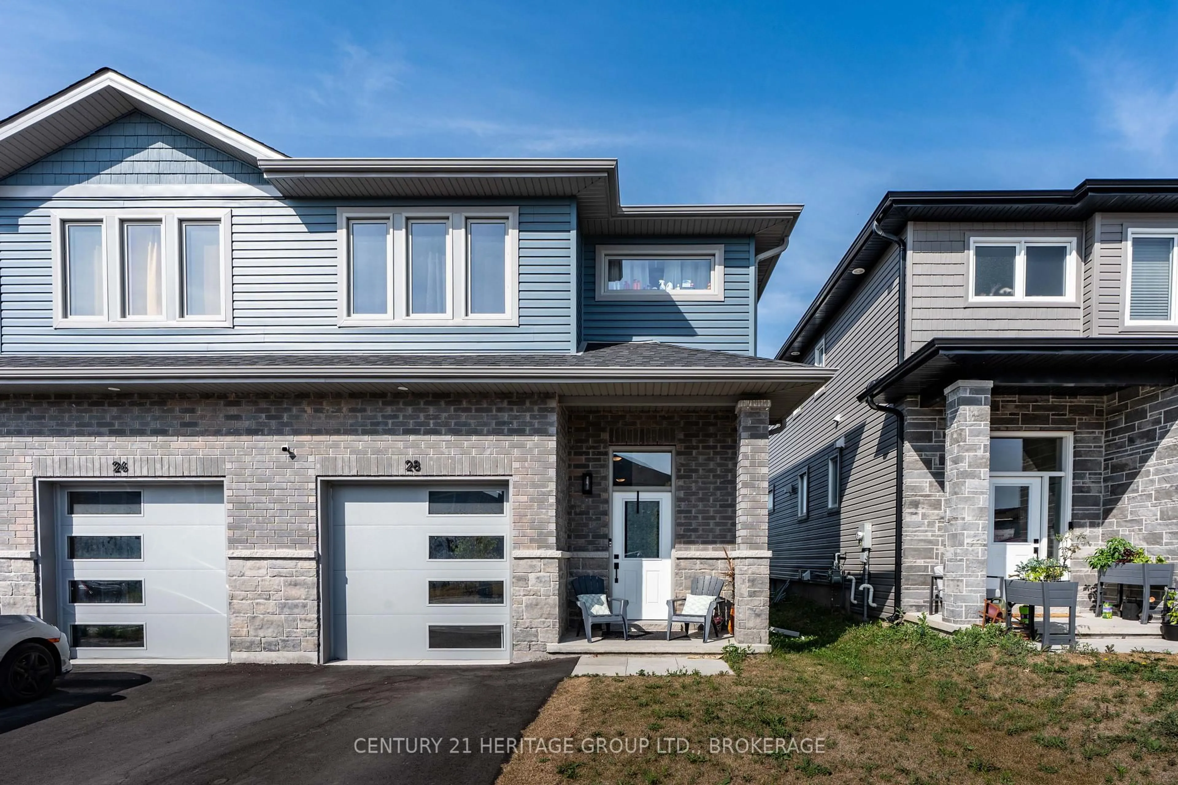Home with brick exterior material, street for 28 Dusenbury Dr, Bissett Creek Ontario K0H 2H0