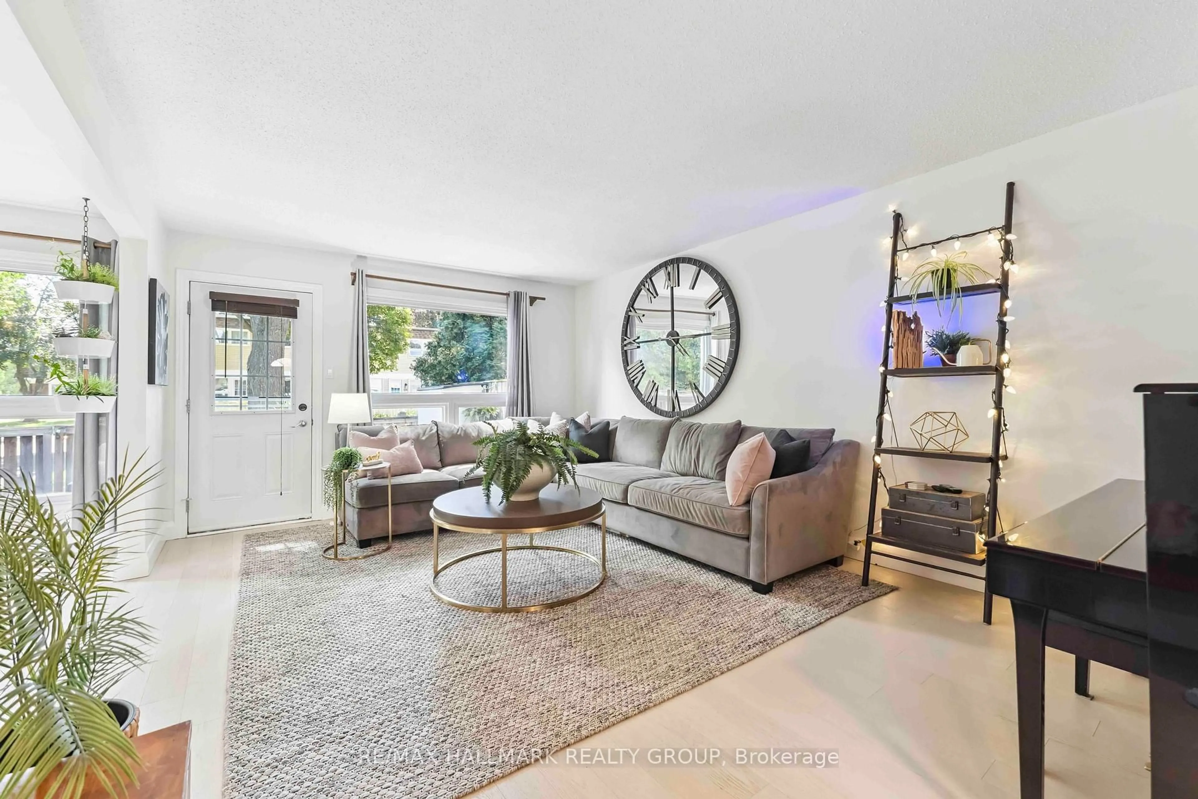 Living room with furniture, unknown for 141 Rutherford Crt, Ottawa Ontario K2K 1N5