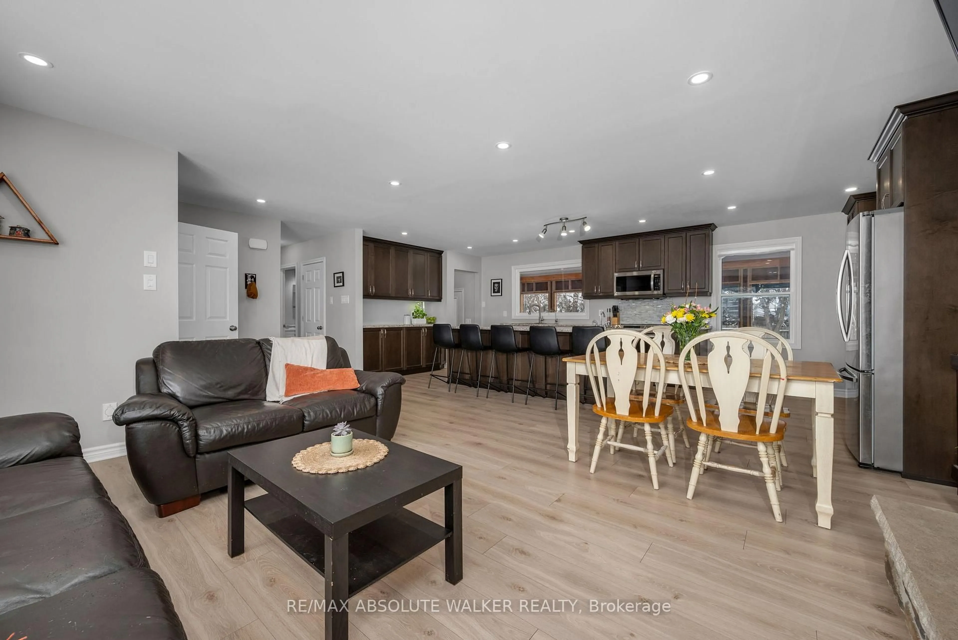 Open concept kitchen, wood/laminate floor for 2477 Merivale Rd, Ottawa Ontario K2C 3H1