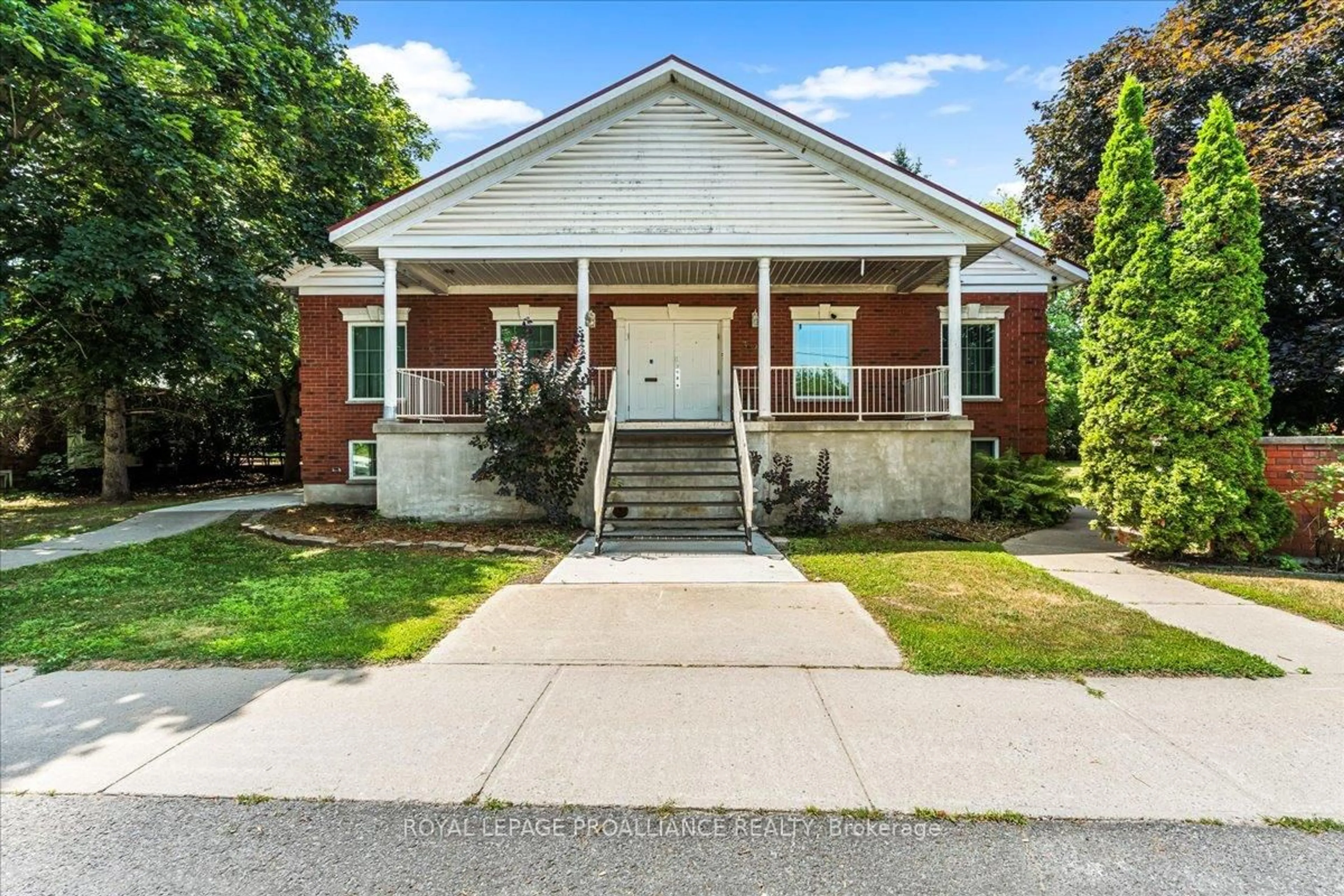 Home with brick exterior material, street for 320 Colborne St, Tweed Ontario K0K 3J0