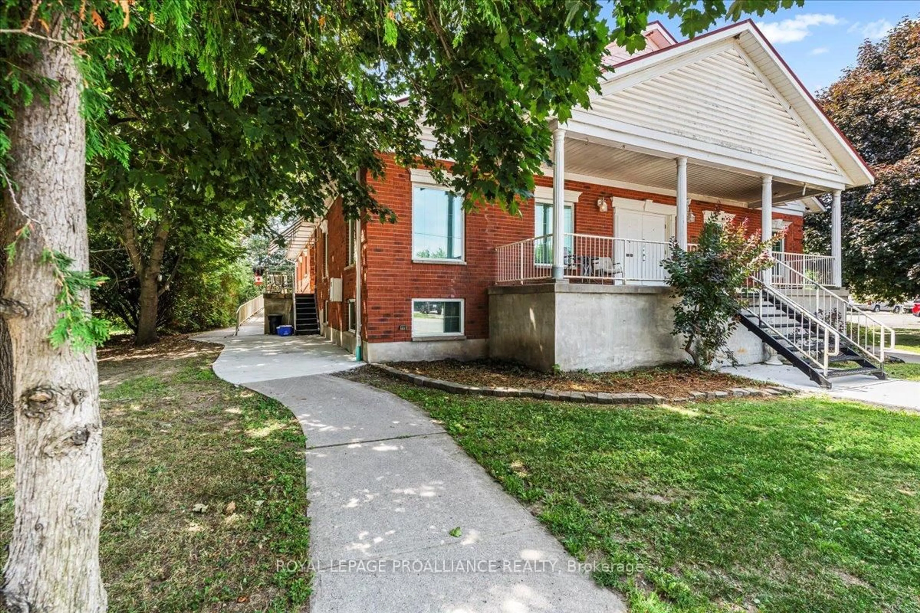 Home with brick exterior material, street for 320 Colborne St, Tweed Ontario K0K 3J0