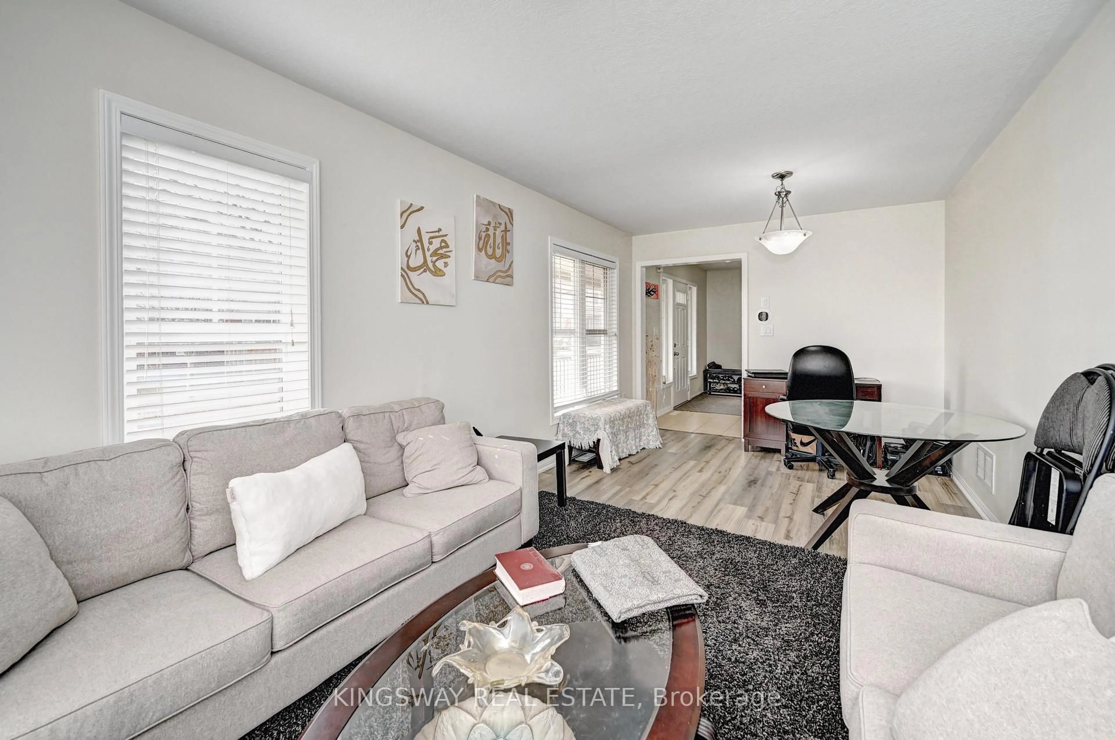 Living room with furniture, wood/laminate floor for 4 DALTON Dr, Cambridge Ontario N3C 0B7