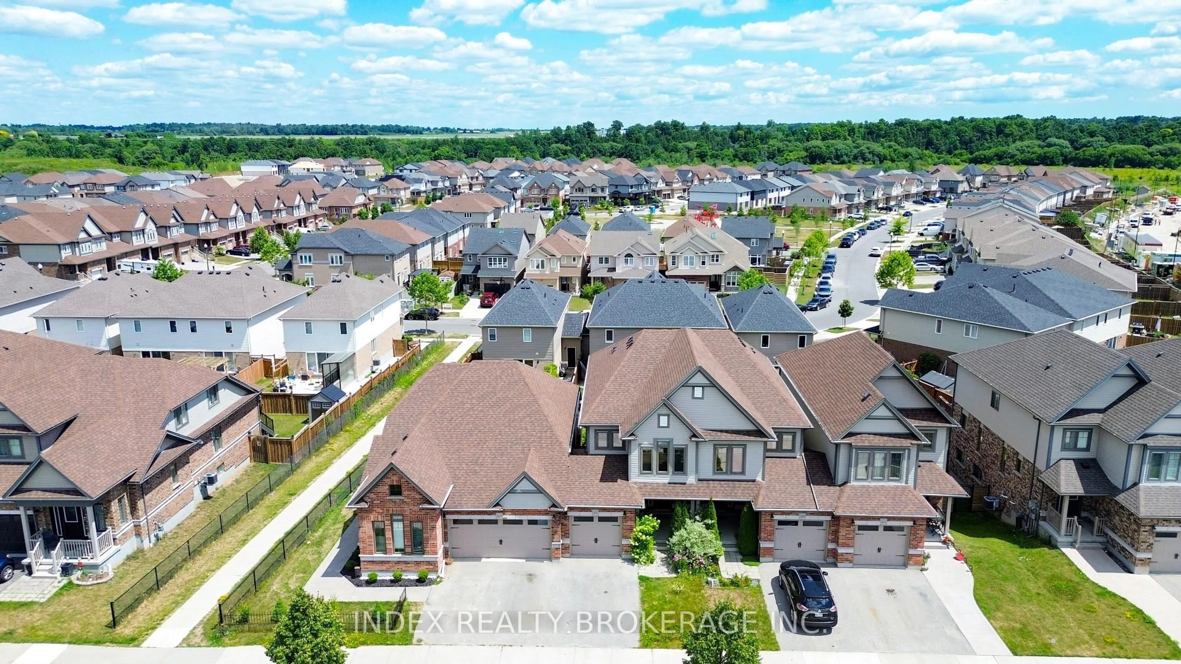 A pic from outside/outdoor area/front of a property/back of a property/a pic from drone, street for 207 Eden Oak Tr, Kitchener Ontario N2A 0H6