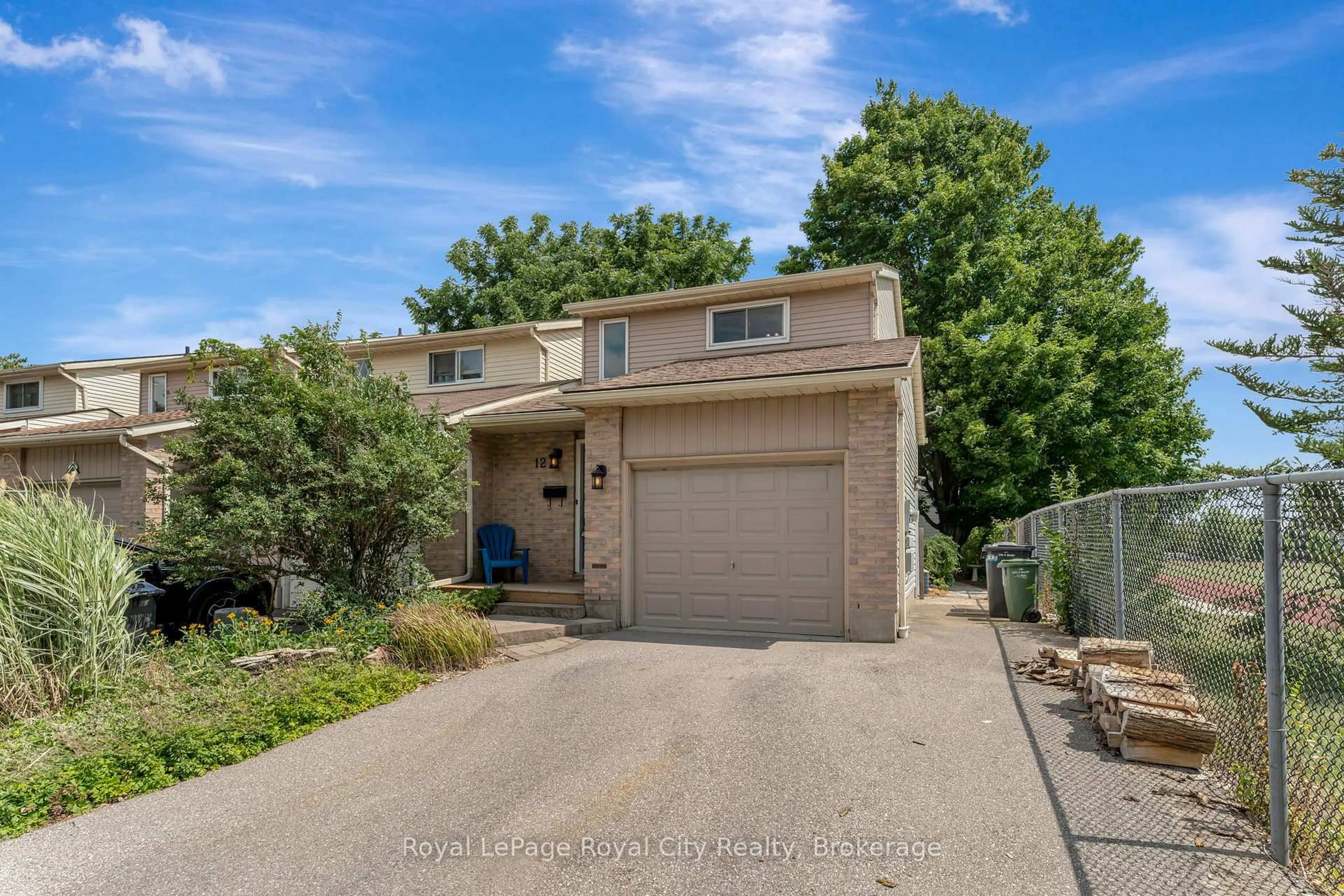 A pic from outside/outdoor area/front of a property/back of a property/a pic from drone, street for 12 Grinyer Dr, Guelph Ontario N1E 6R7