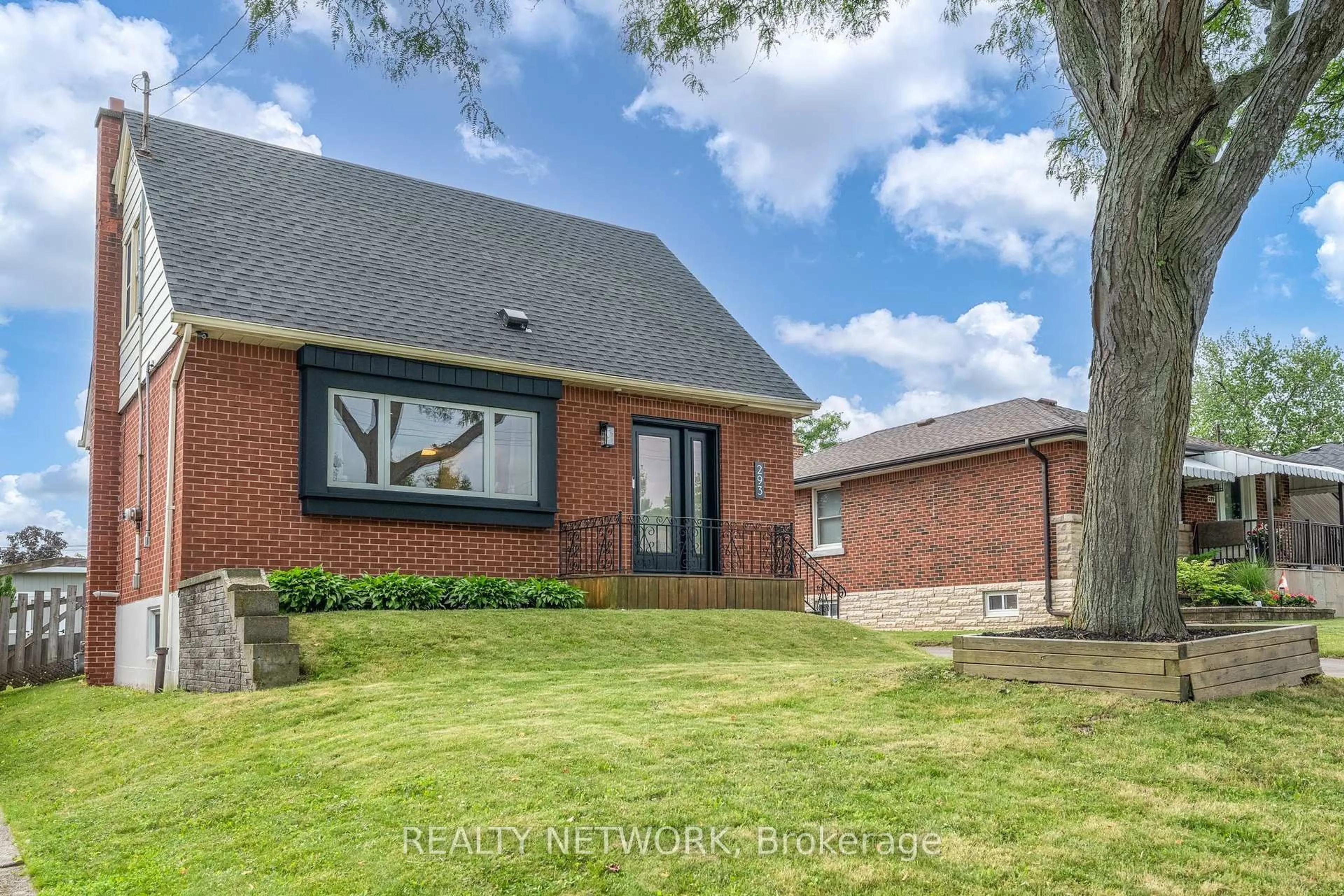 Home with brick exterior material, street for 293 East 45th St, Hamilton Ontario L8T 3K7