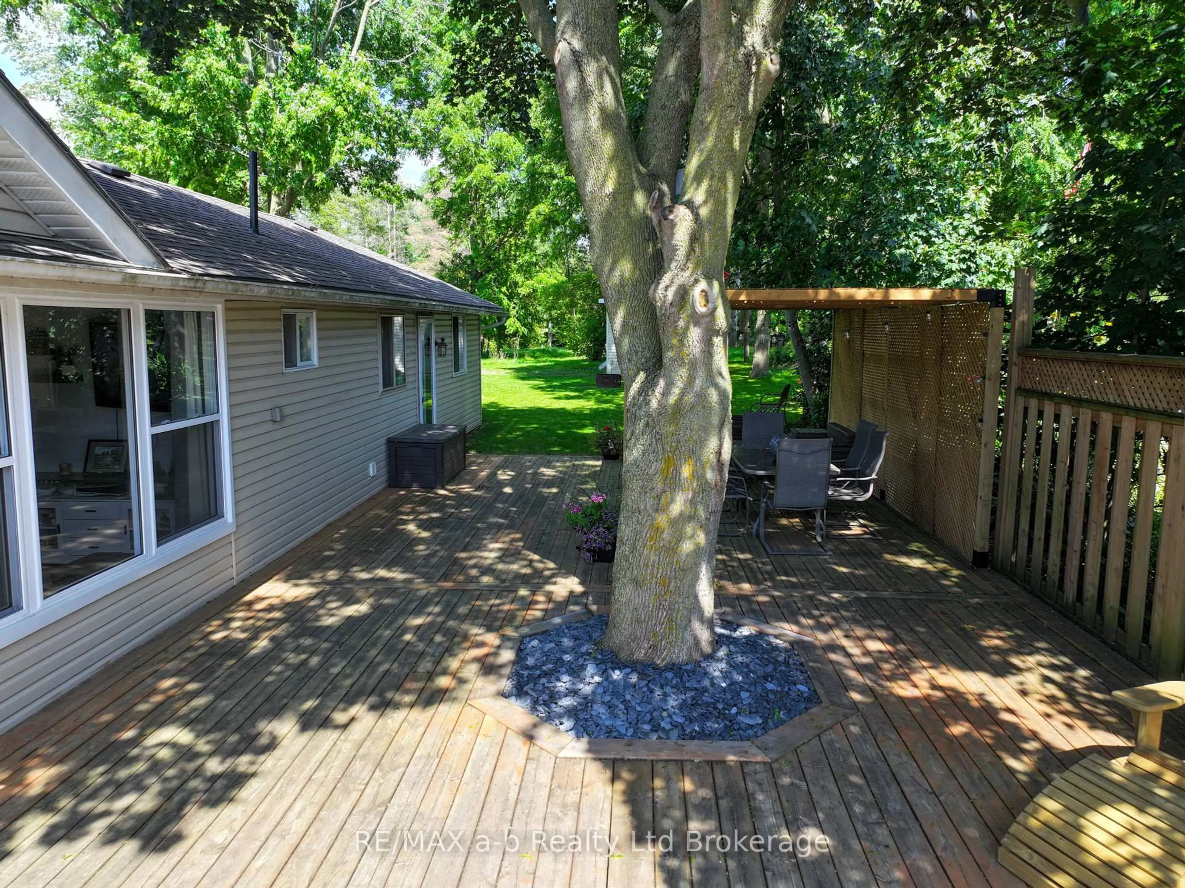 A pic from outside/outdoor area/front of a property/back of a property/a pic from drone, forest/trees view for 84 BAIRD St, Blandford-Blenheim Ontario N0J 1B0