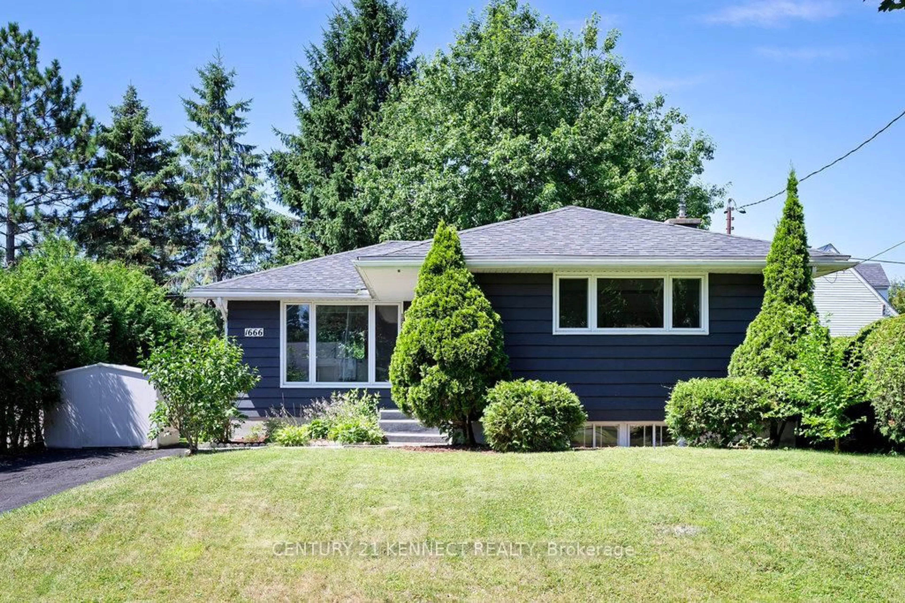 Home with vinyl exterior material, street for 1666 Fisher Ave, Ottawa Ontario K2C 1X7