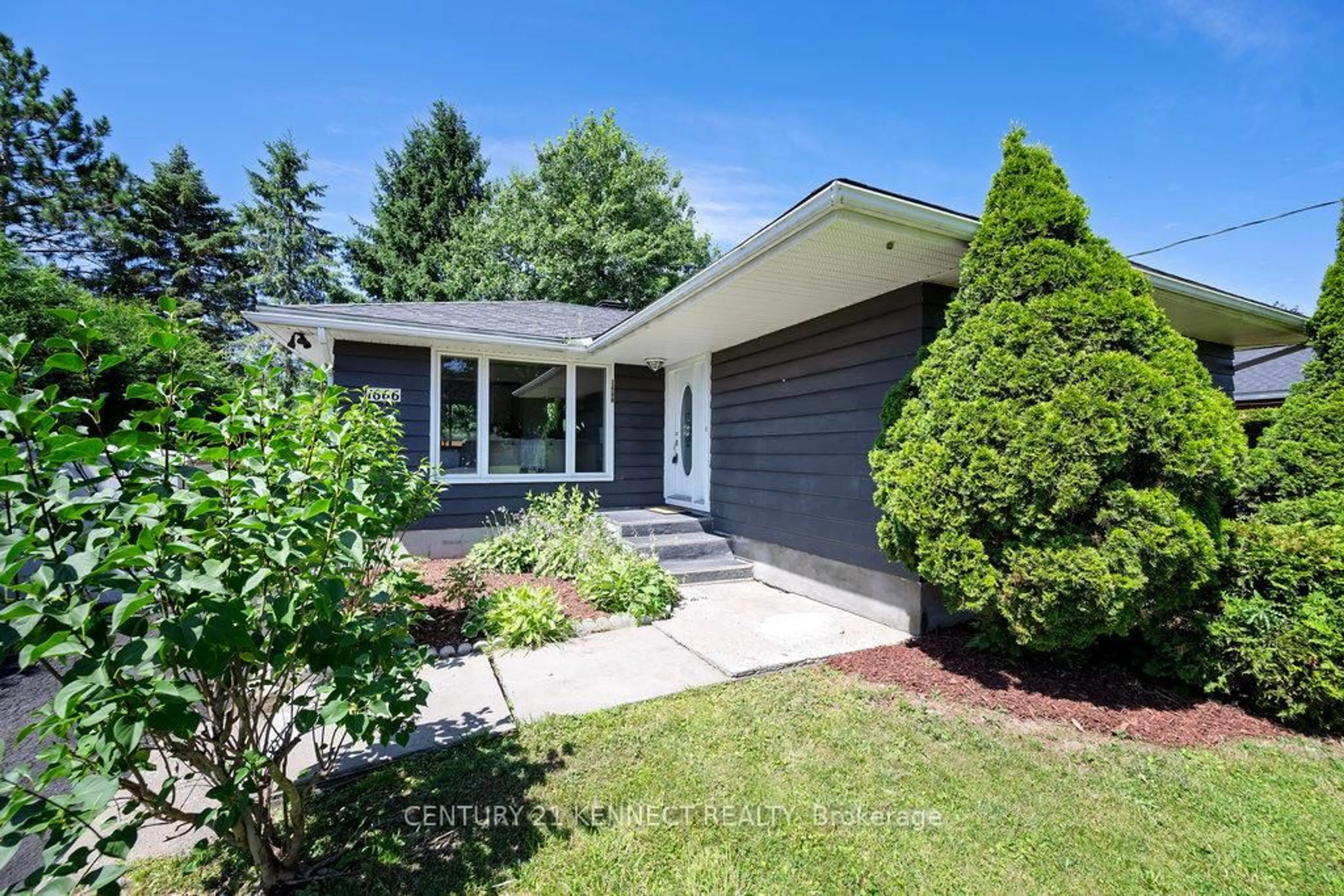 Home with vinyl exterior material, street for 1666 Fisher Ave, Ottawa Ontario K2C 1X7