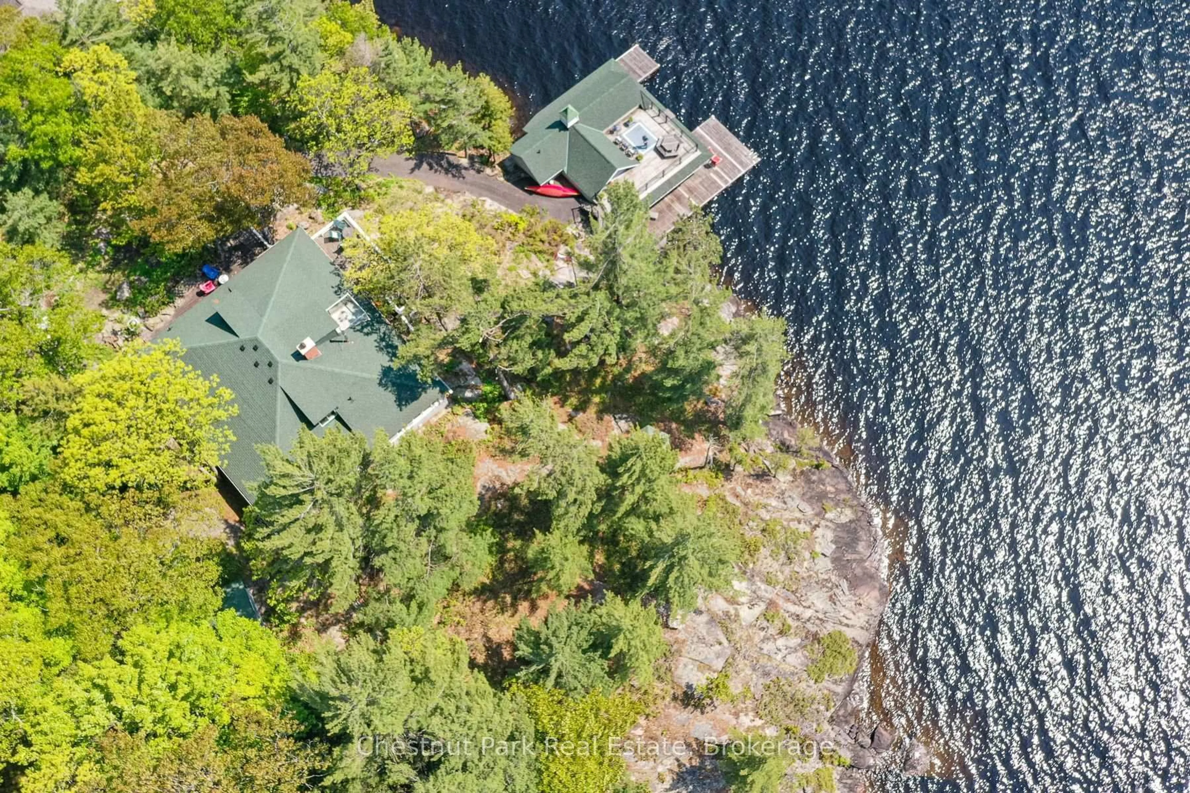 A pic from outside/outdoor area/front of a property/back of a property/a pic from drone, water/lake/river/ocean view for 1869 Muskoka 118 Rd #8, Muskoka Lakes Ontario P1L 1W8