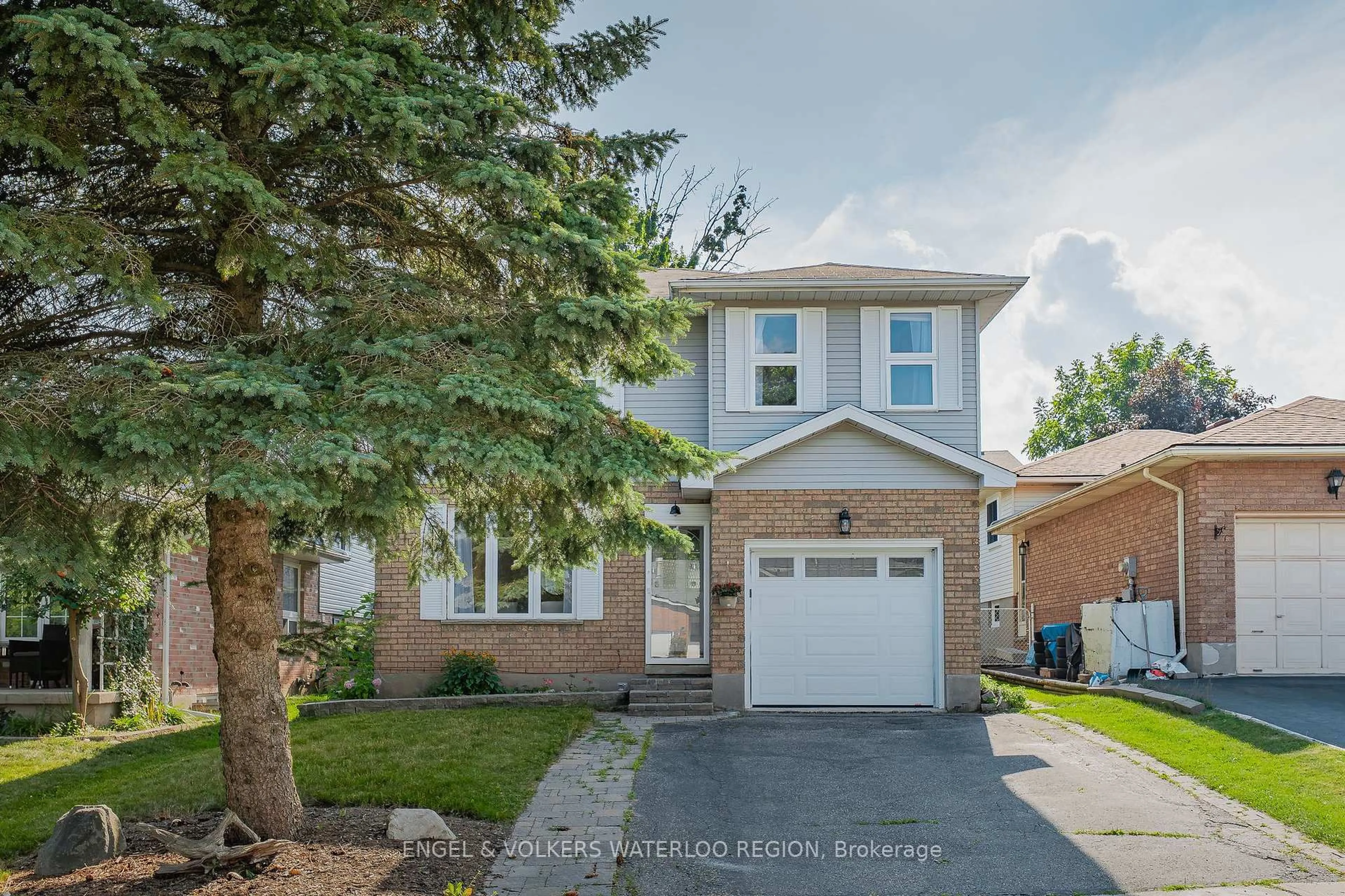 Home with brick exterior material, street for 323 Newbury Dr, Kitchener Ontario N2N 3A3