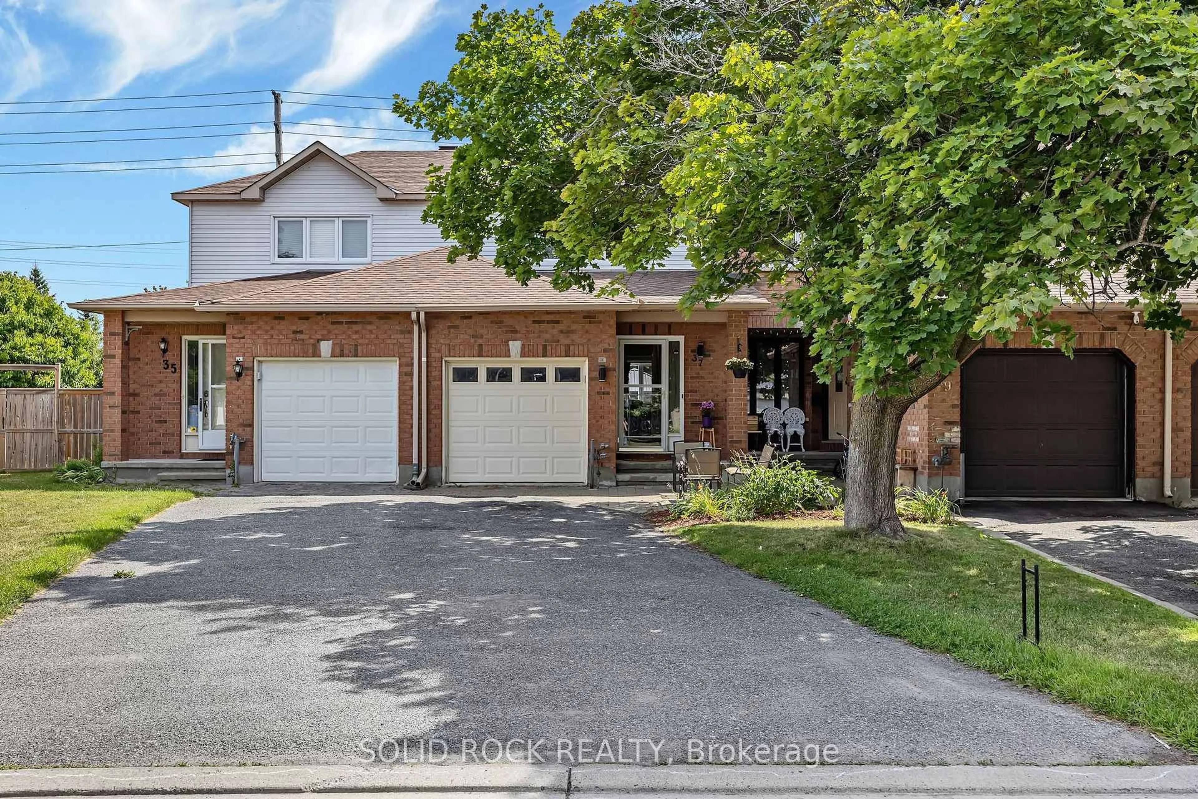 Home with brick exterior material, street for 37 Grenadier Way, Ottawa Ontario K2J 4L3