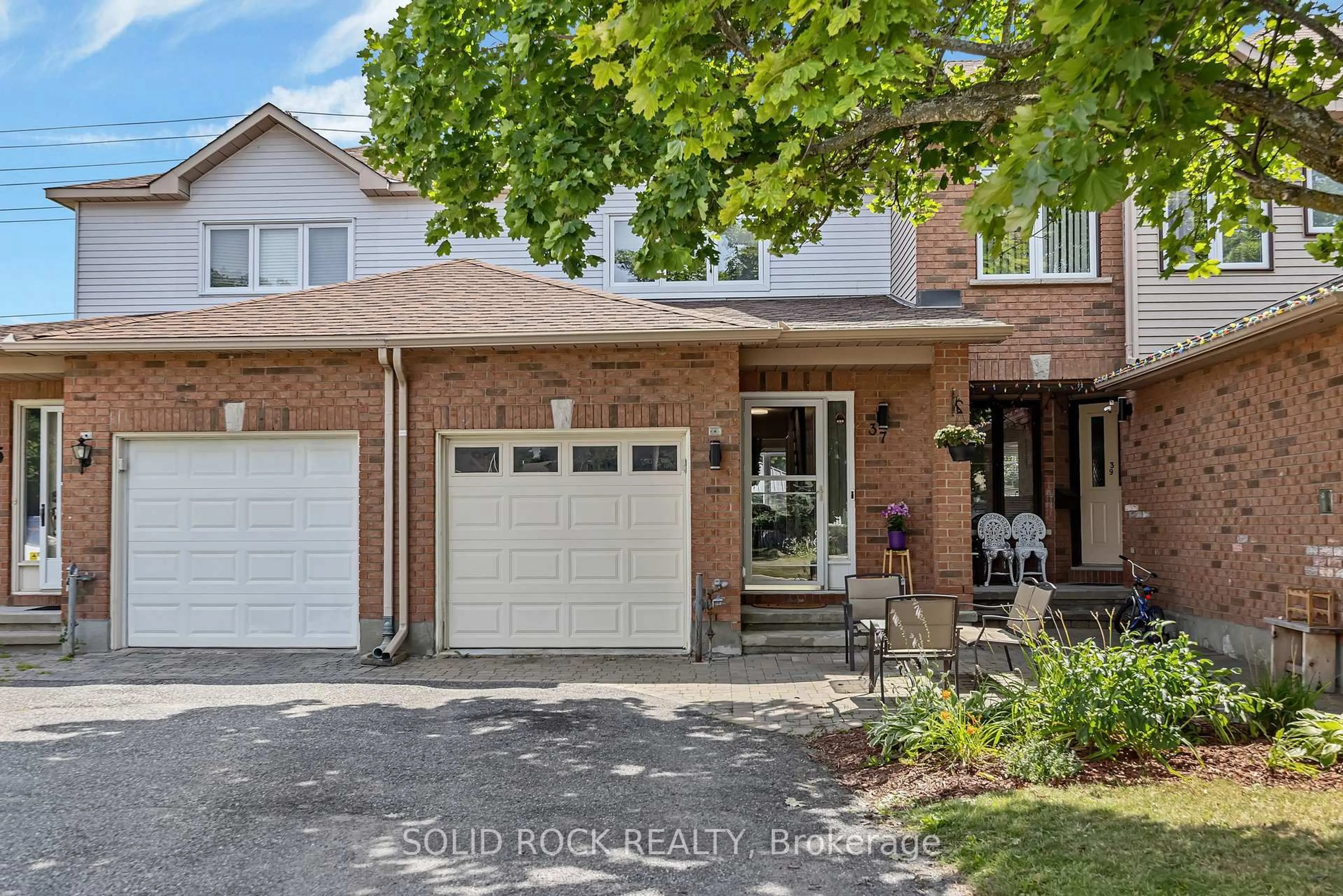 Home with brick exterior material, street for 37 Grenadier Way, Ottawa Ontario K2J 4L3