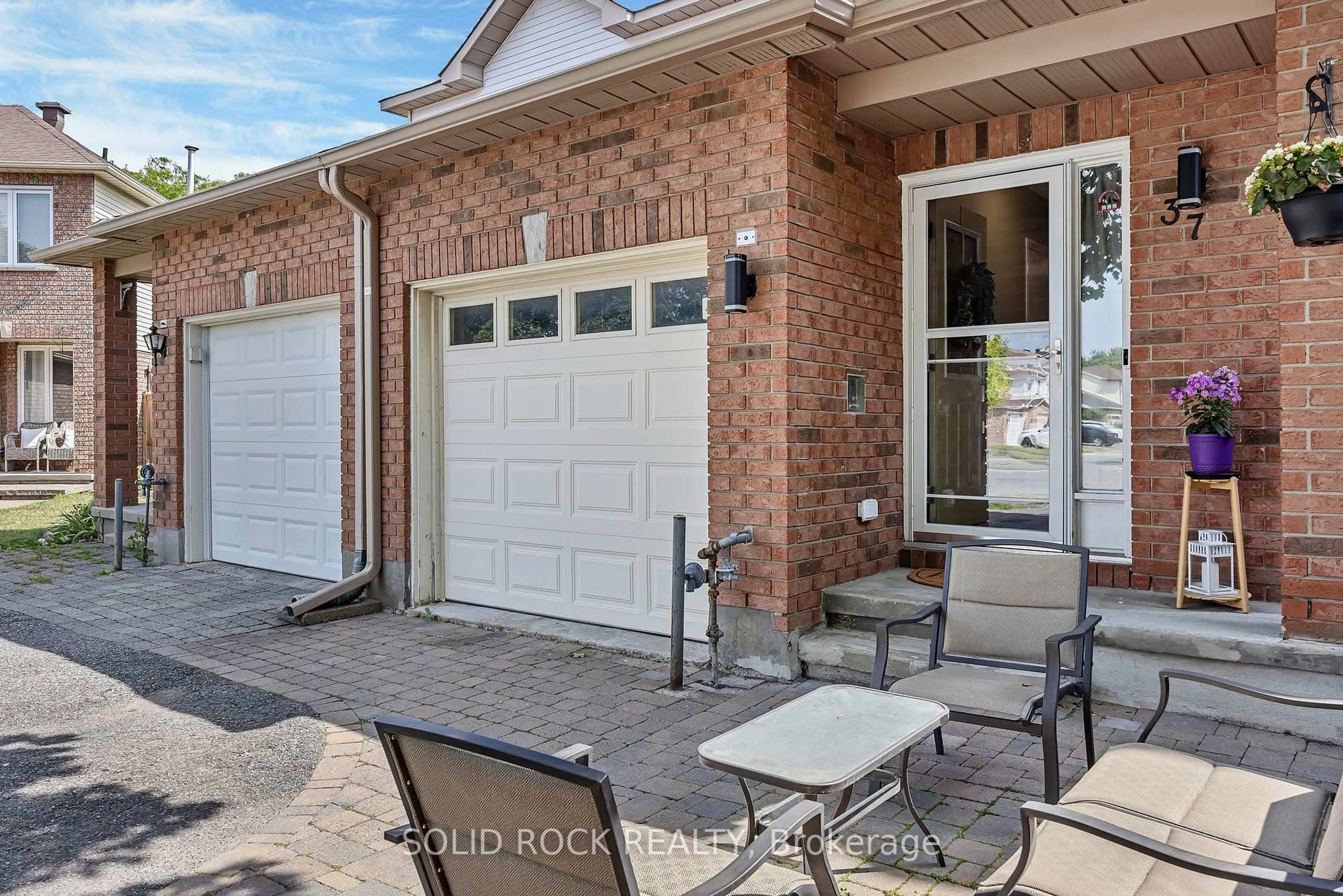Home with brick exterior material, street for 37 Grenadier Way, Ottawa Ontario K2J 4L3