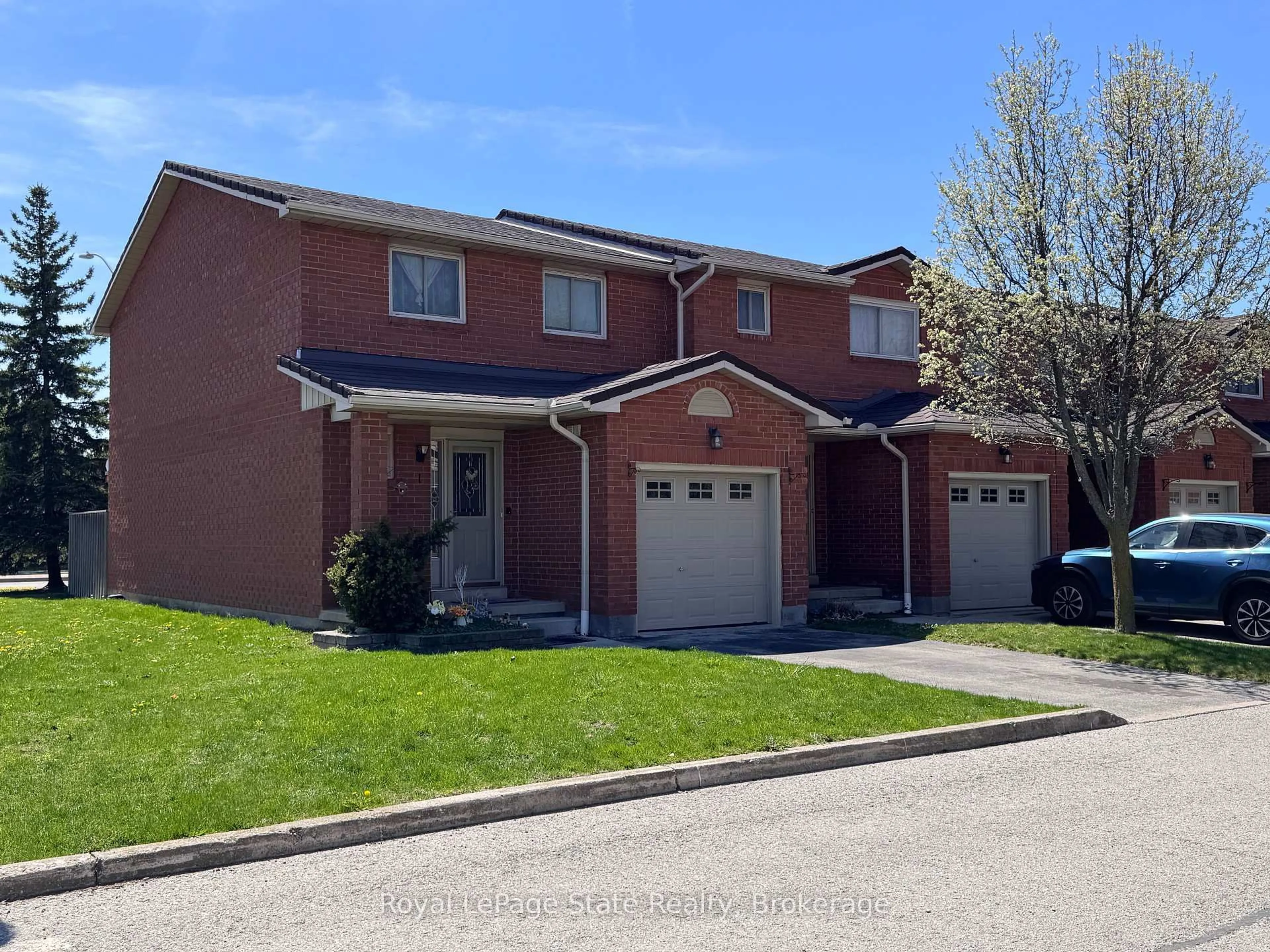 Home with brick exterior material, street for 391 Stone Church Rd #1, Hamilton Ontario L9B 2H2