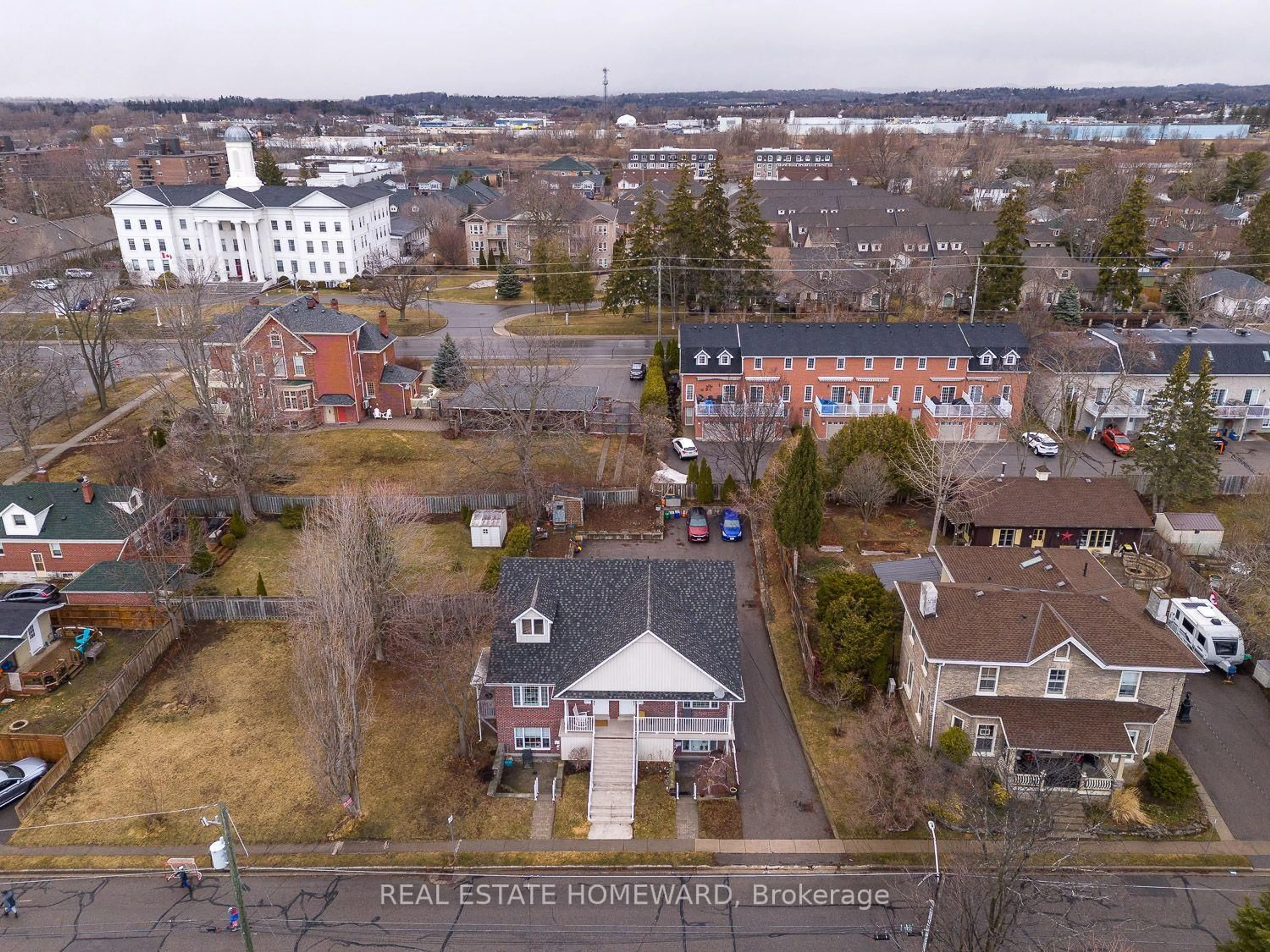 A pic from outside/outdoor area/front of a property/back of a property/a pic from drone, city buildings view from balcony for 106 Anne St #102, Cobourg Ontario K9A 1G5