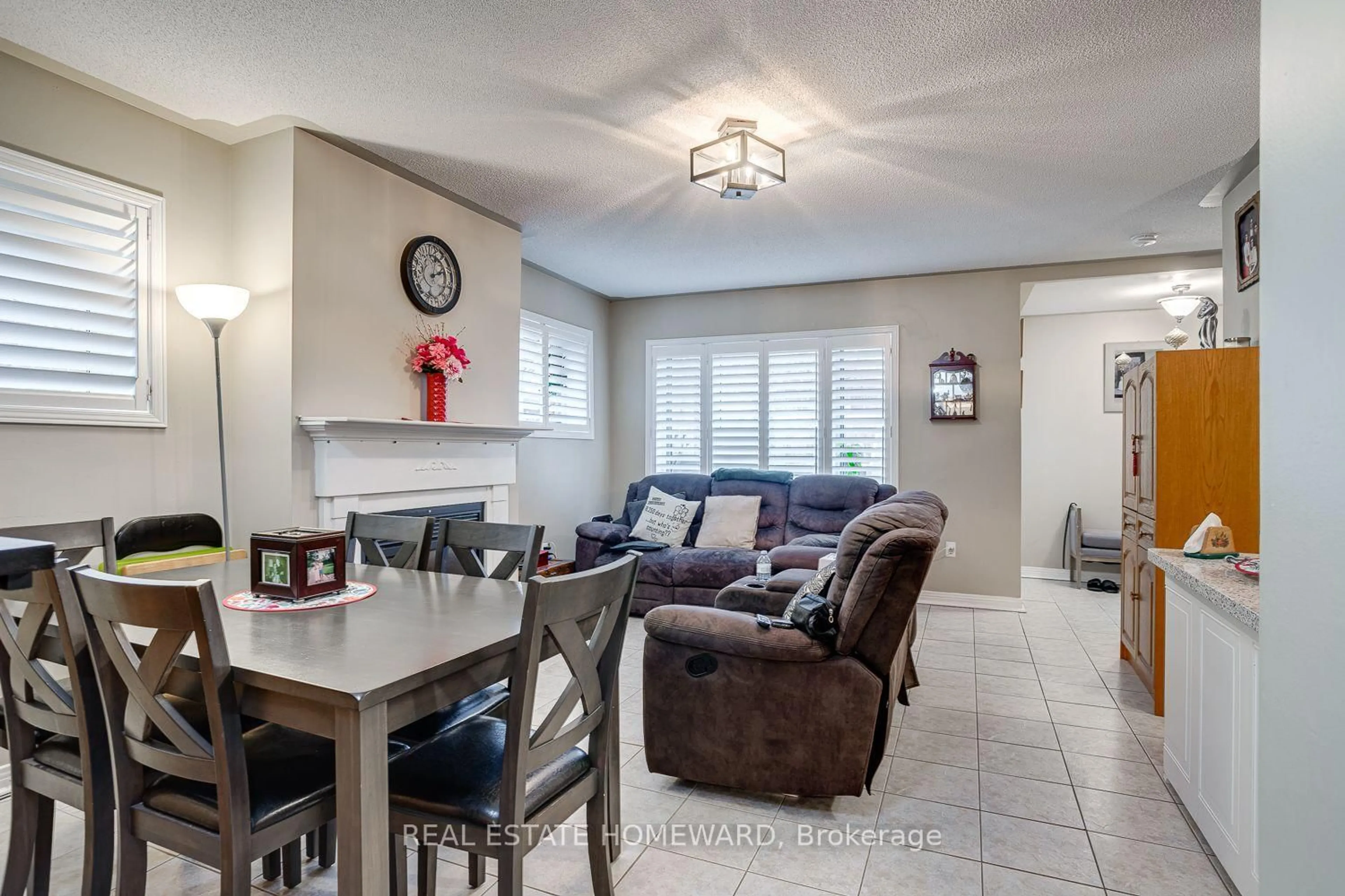 Living room with furniture, ceramic/tile floor for 106 Anne St #102, Cobourg Ontario K9A 1G5