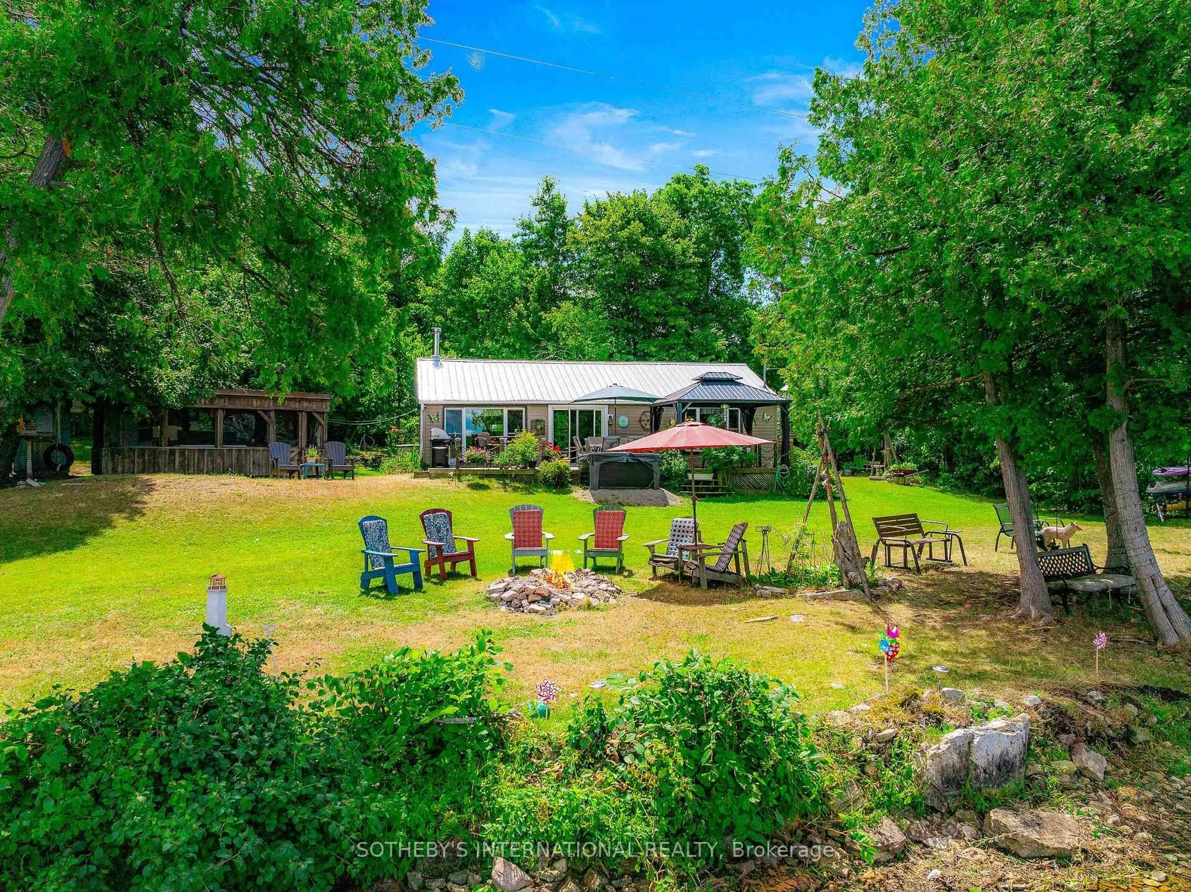 A pic from outside/outdoor area/front of a property/back of a property/a pic from drone, water/lake/river/ocean view for 110 Graham Lake Rd, Front of Yonge Ontario K0E 1M0