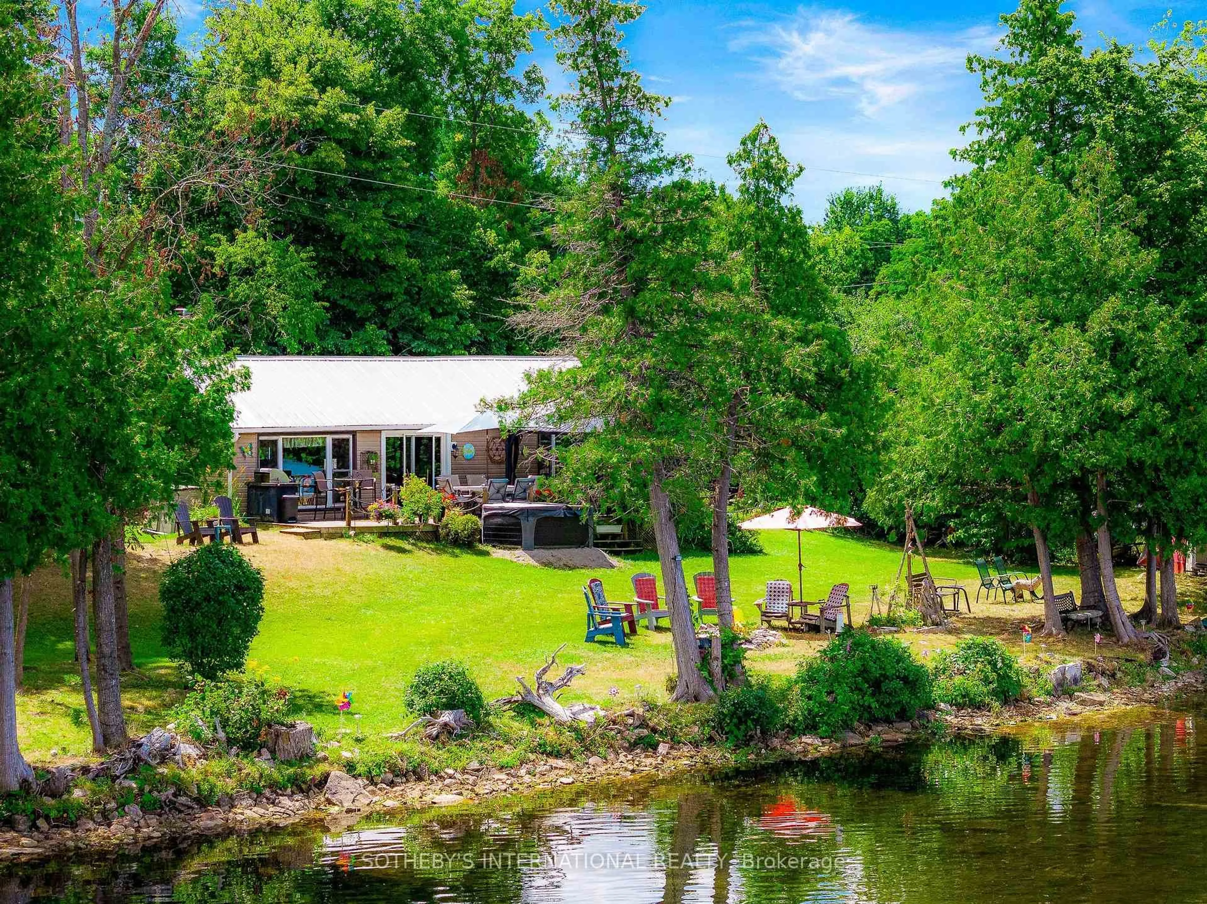 A pic from outside/outdoor area/front of a property/back of a property/a pic from drone, water/lake/river/ocean view for 110 Graham Lake Rd, Front of Yonge Ontario K0E 1M0