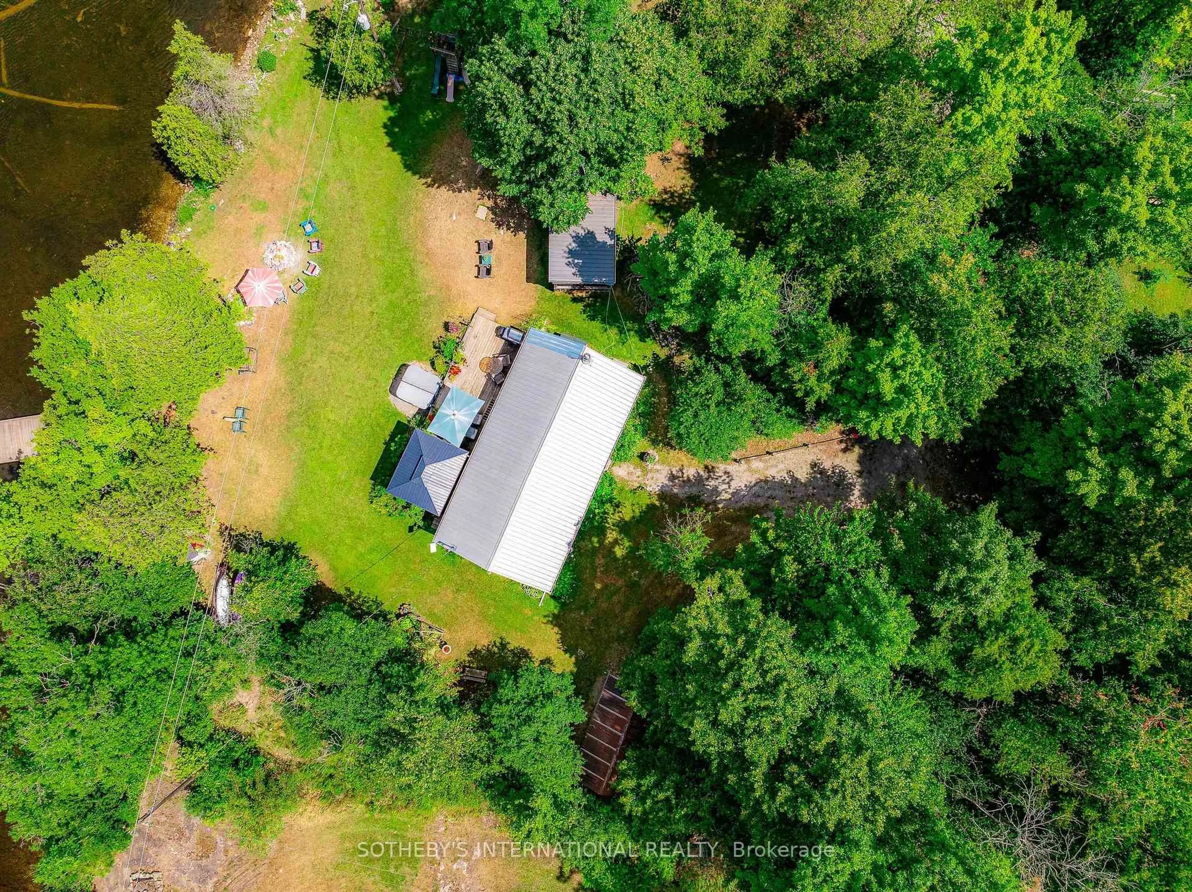 A pic from outside/outdoor area/front of a property/back of a property/a pic from drone, forest/trees view for 110 Graham Lake Rd, Front of Yonge Ontario K0E 1M0