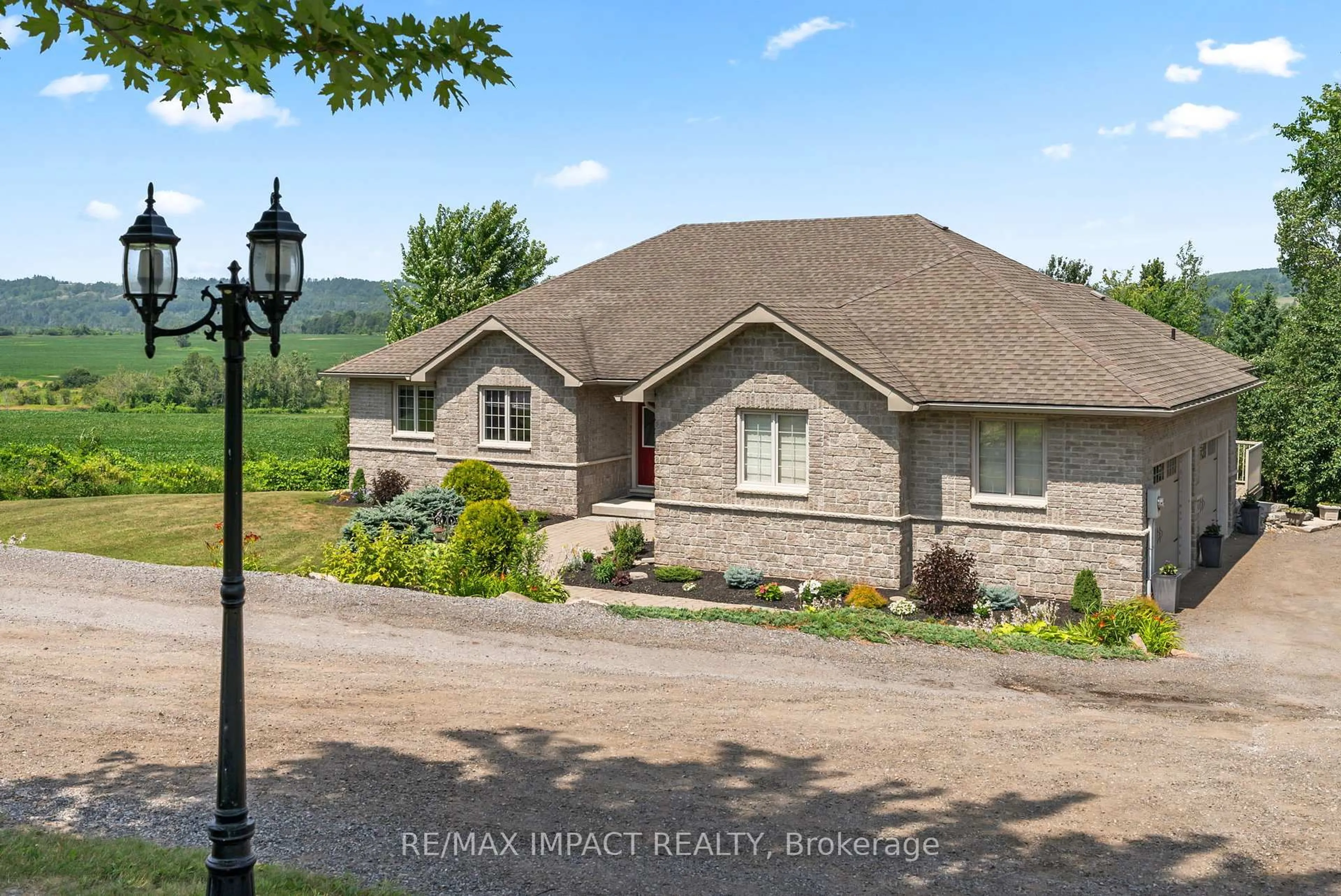 Home with brick exterior material, street for 422 7A Highway, Cavan Monaghan Ontario L0A 1C0