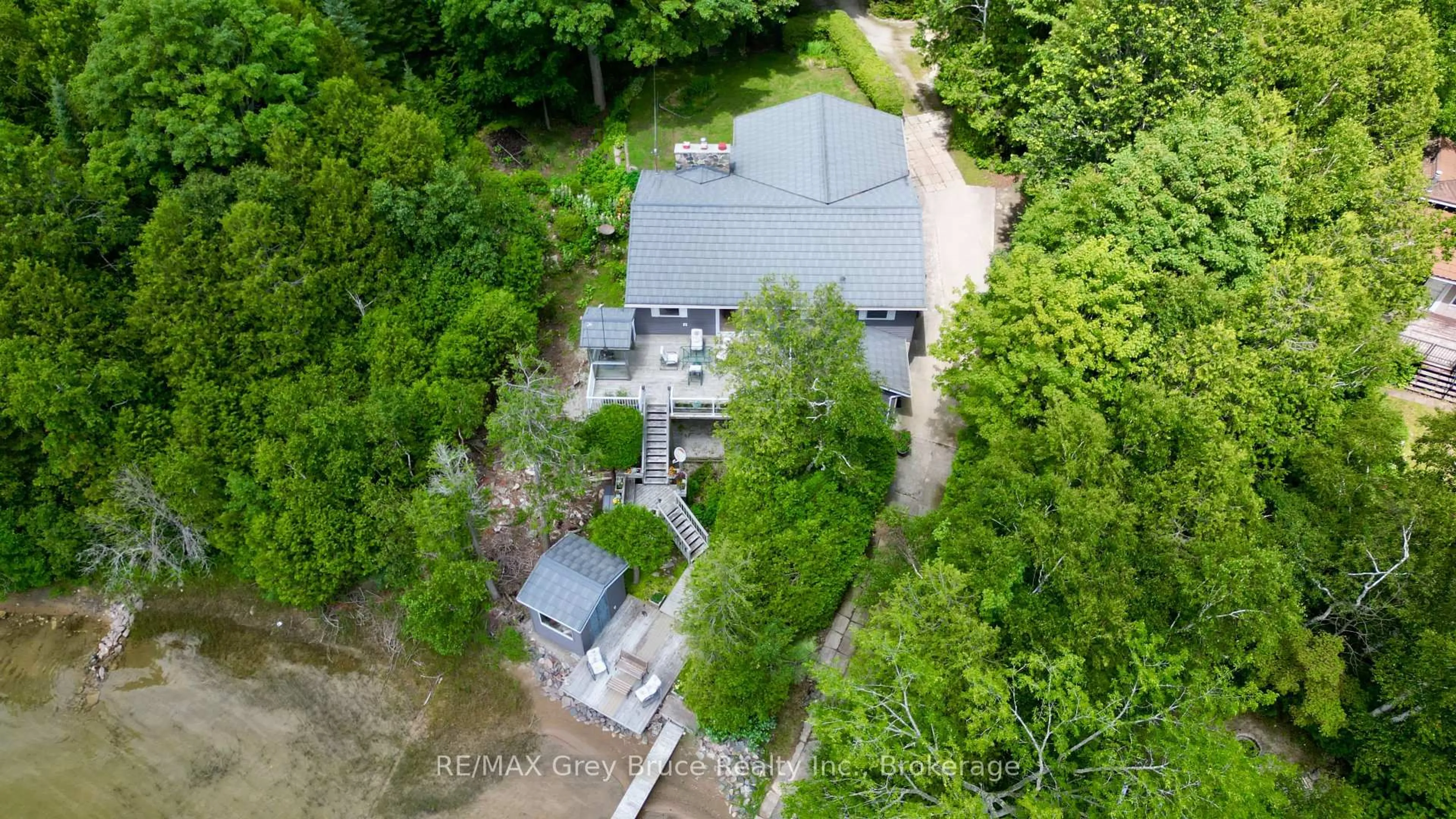 A pic from outside/outdoor area/front of a property/back of a property/a pic from drone, unknown for 340 Barney's Blvd, Northern Bruce Peninsula Ontario N0H 1Z0